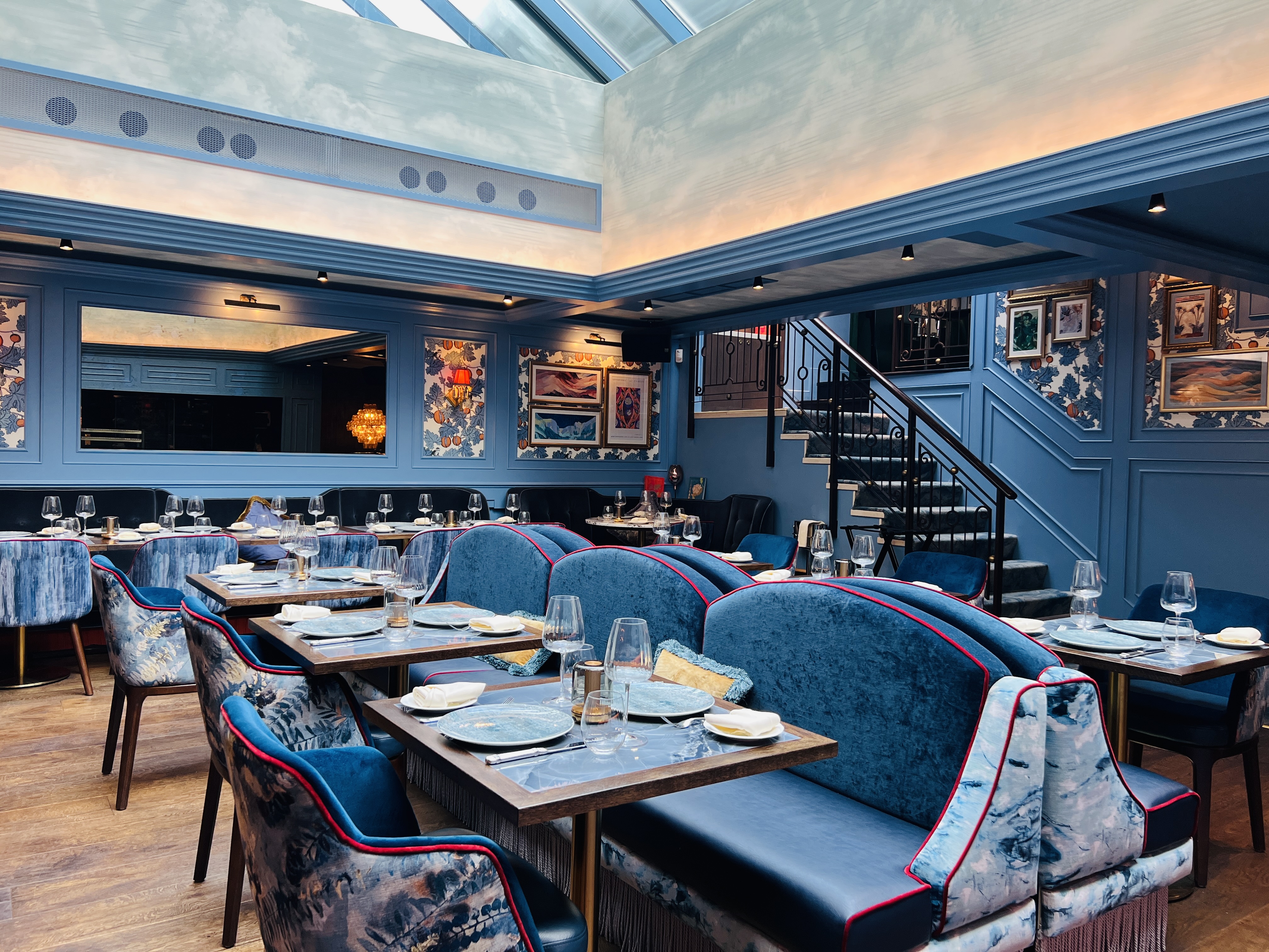 Boutique Meadow and Ridge rooms with blue banquettes for corporate dining and private events.