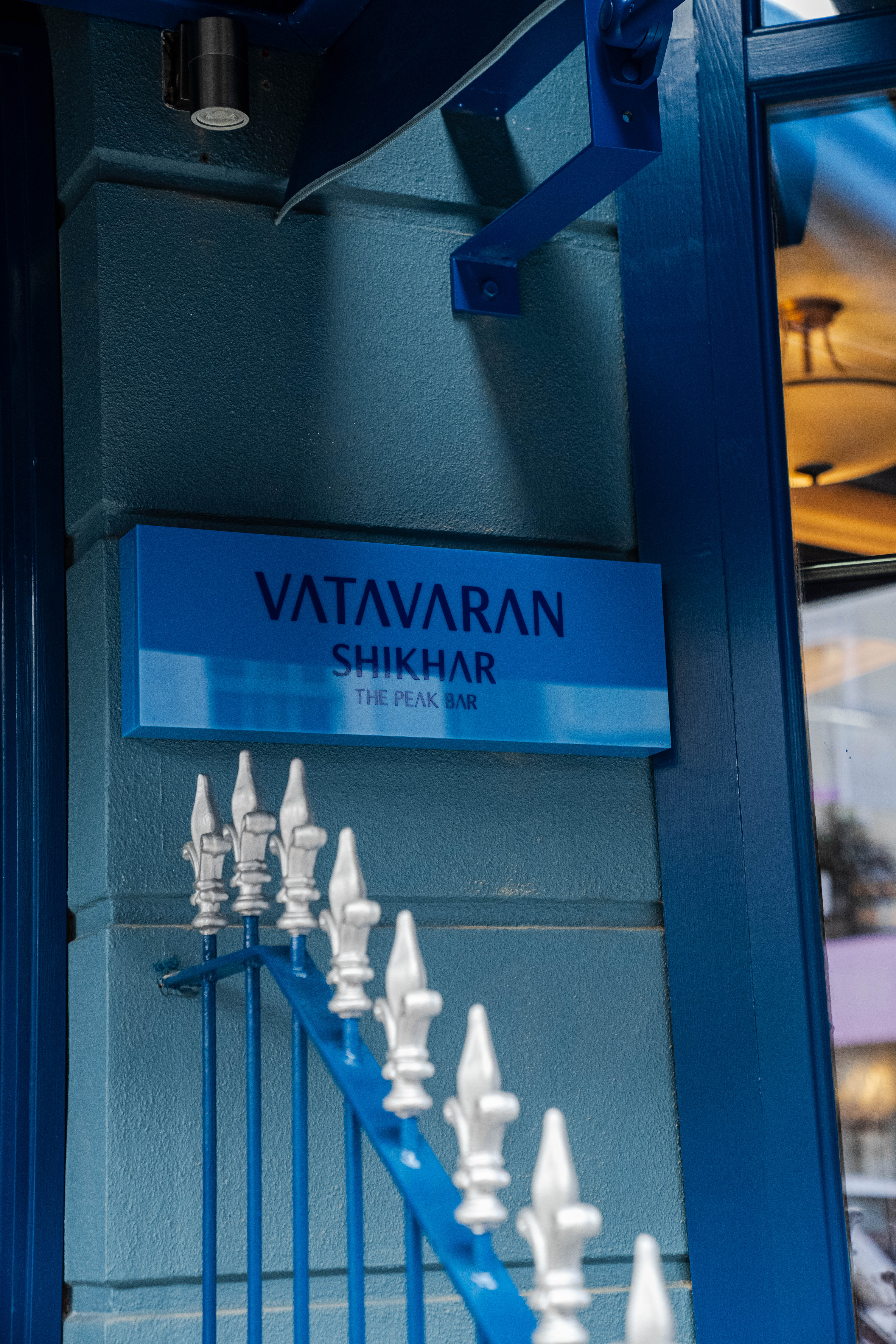 Vatavaran Shikhar peak bar signage for corporate reception and VIP event venue wayfinding.