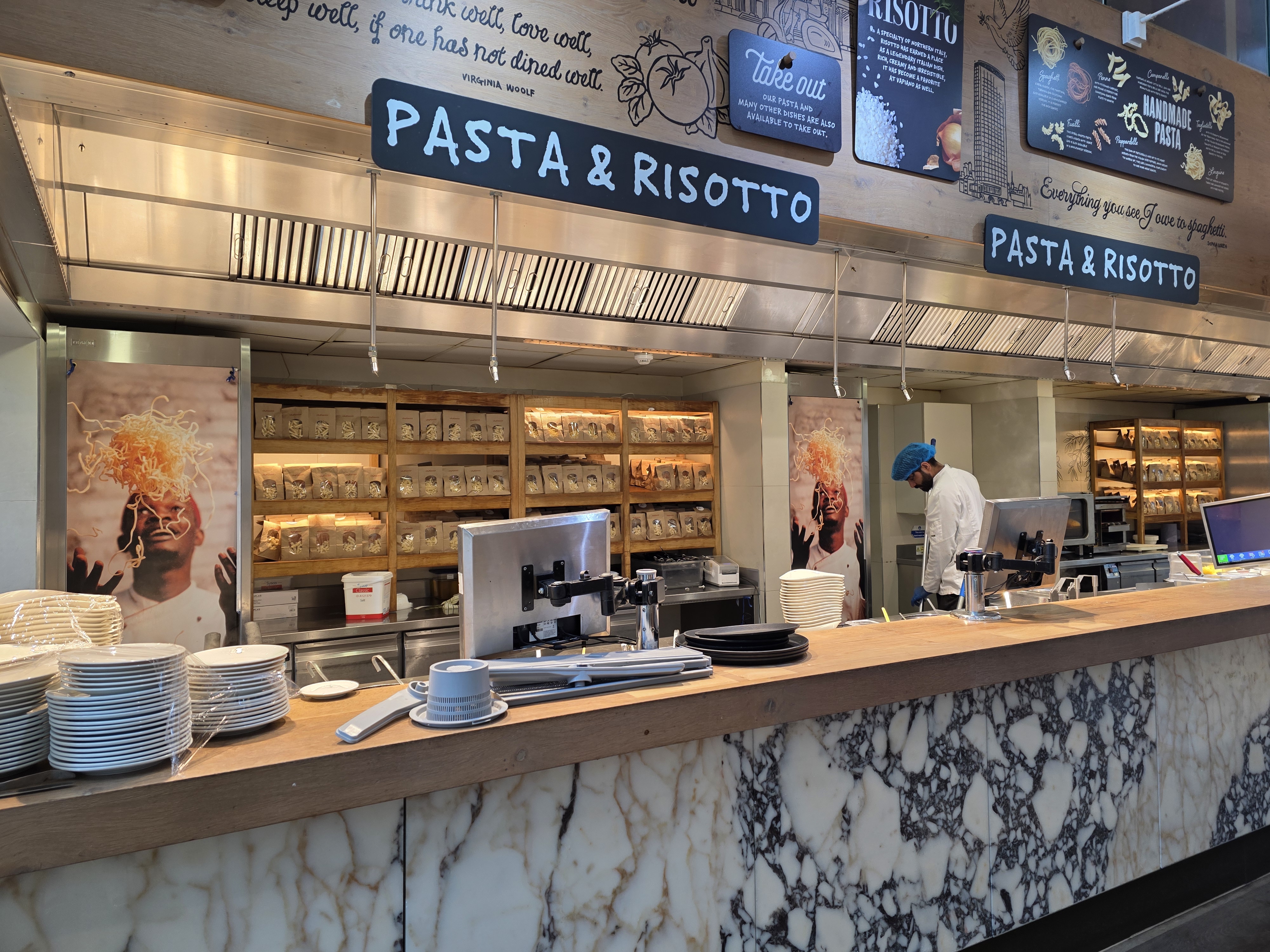 "Exclusive hire venue at Vapiano, featuring a modern pasta station for events."