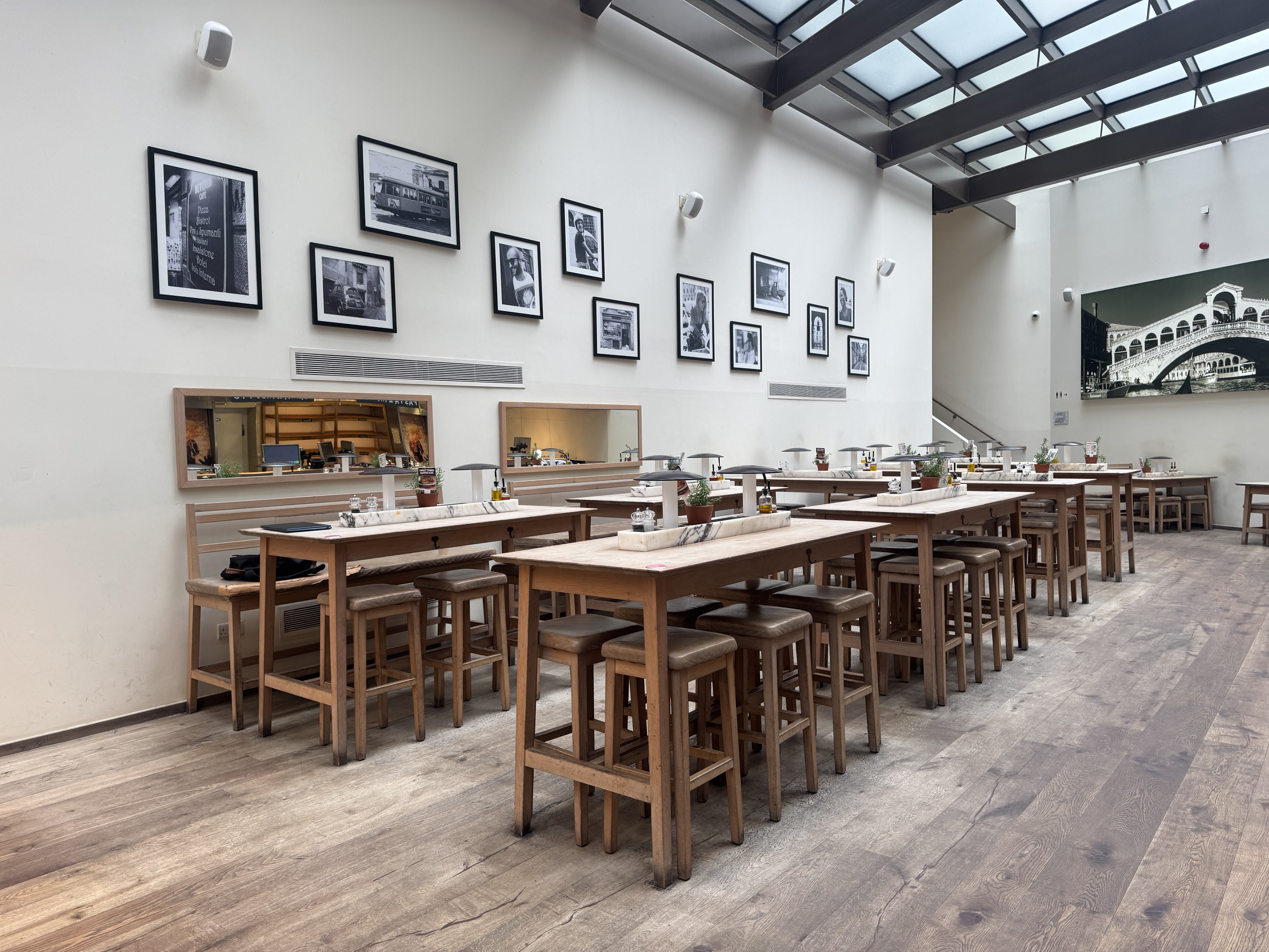 Spacious Pasta Kitchen dining area at Vapiano Tower Bridge for networking events and celebrations.