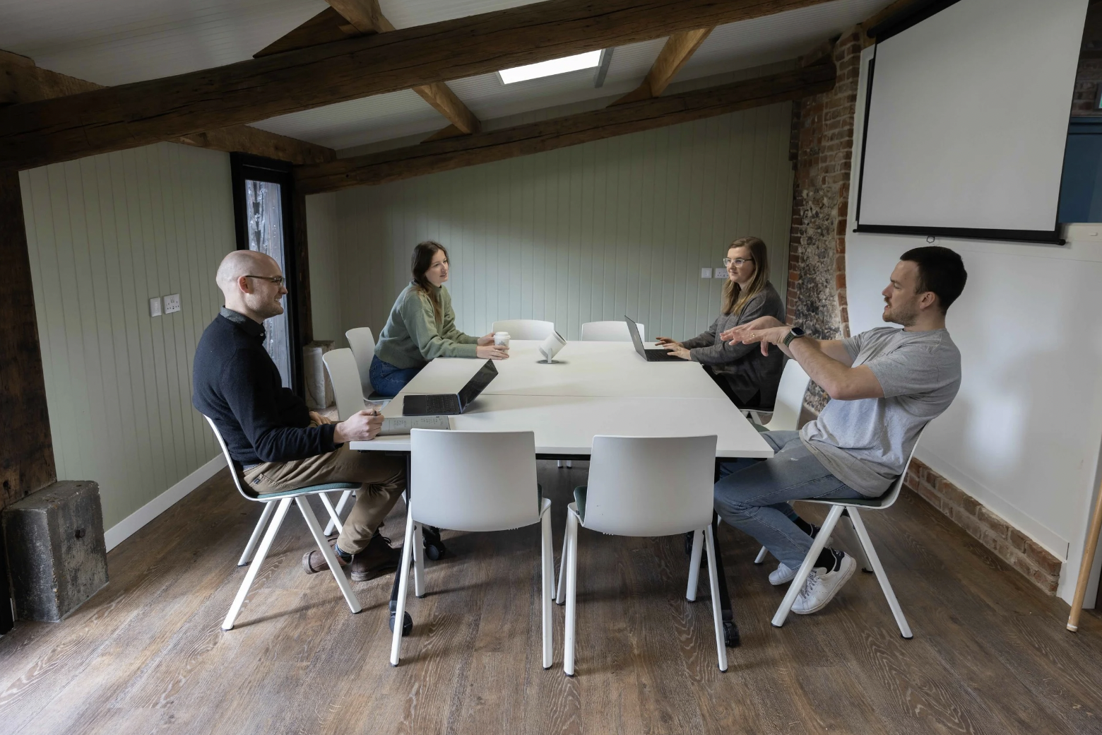 Spacious indoor meeting room for collaboration at The Walled Garden, West Wycombe.