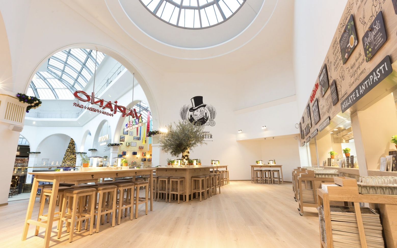 Modern venue in Vapiano, Manchester for corporate events and receptions, featuring elegant seating.