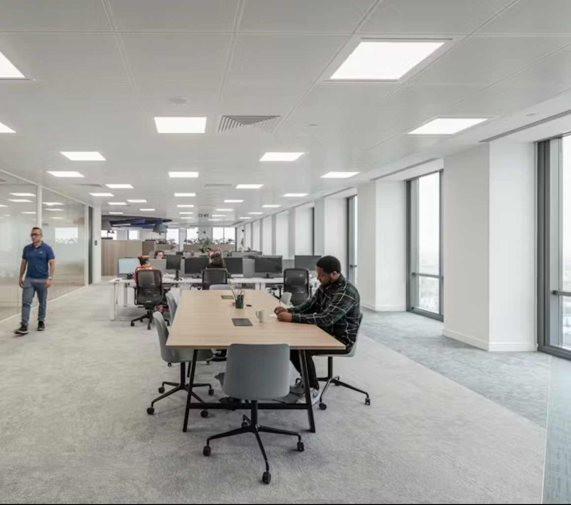 Modern meeting room in Datatonic with natural light, perfect for events and workshops.