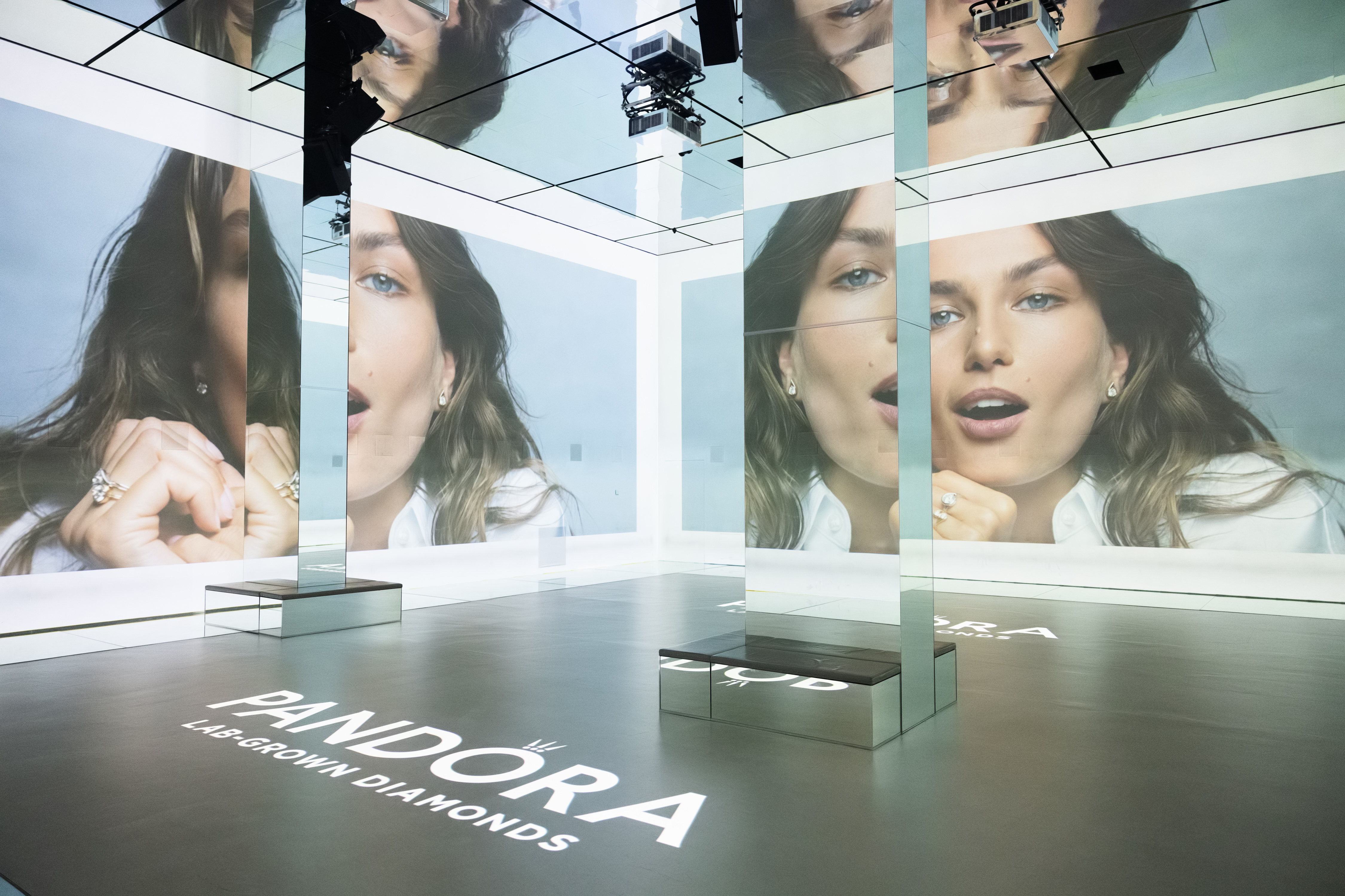 Dynamic event space with immersive projections for product launches and brand activations.