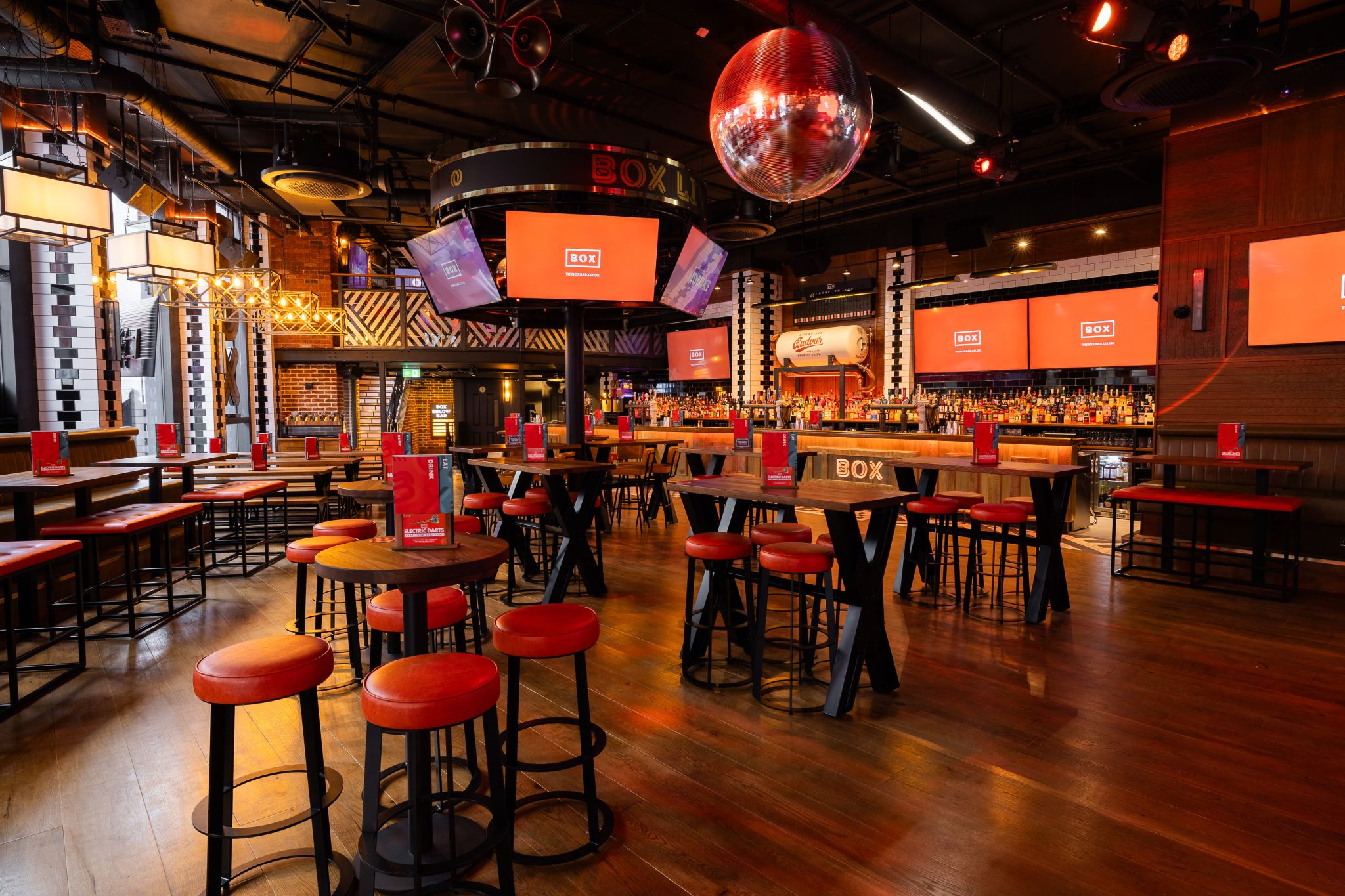 "Vibrant BOX Piccadilly event space with modern decor for casual gatherings and parties."