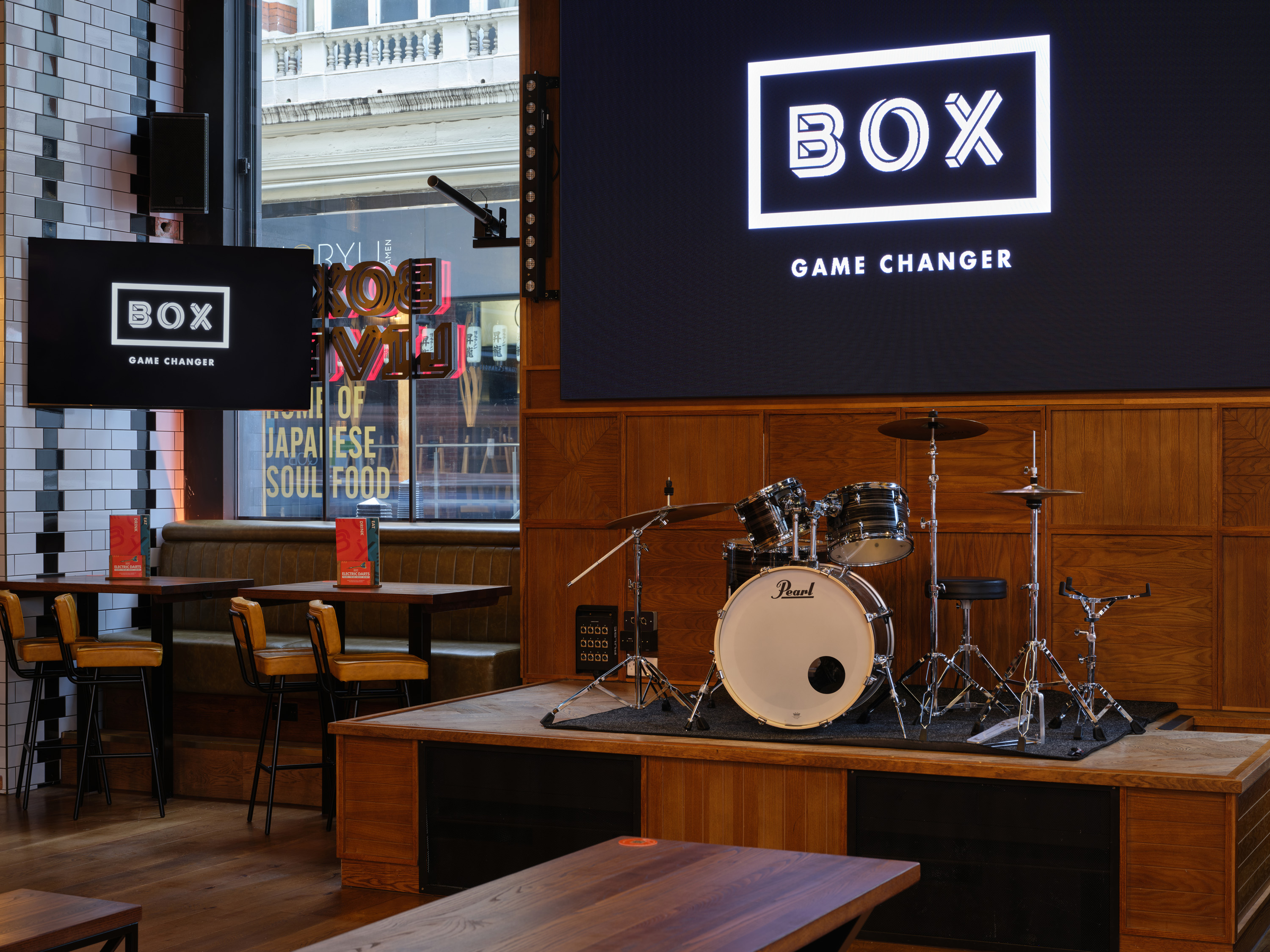"Versatile BOX Piccadilly event space with stage for live performances and presentations."