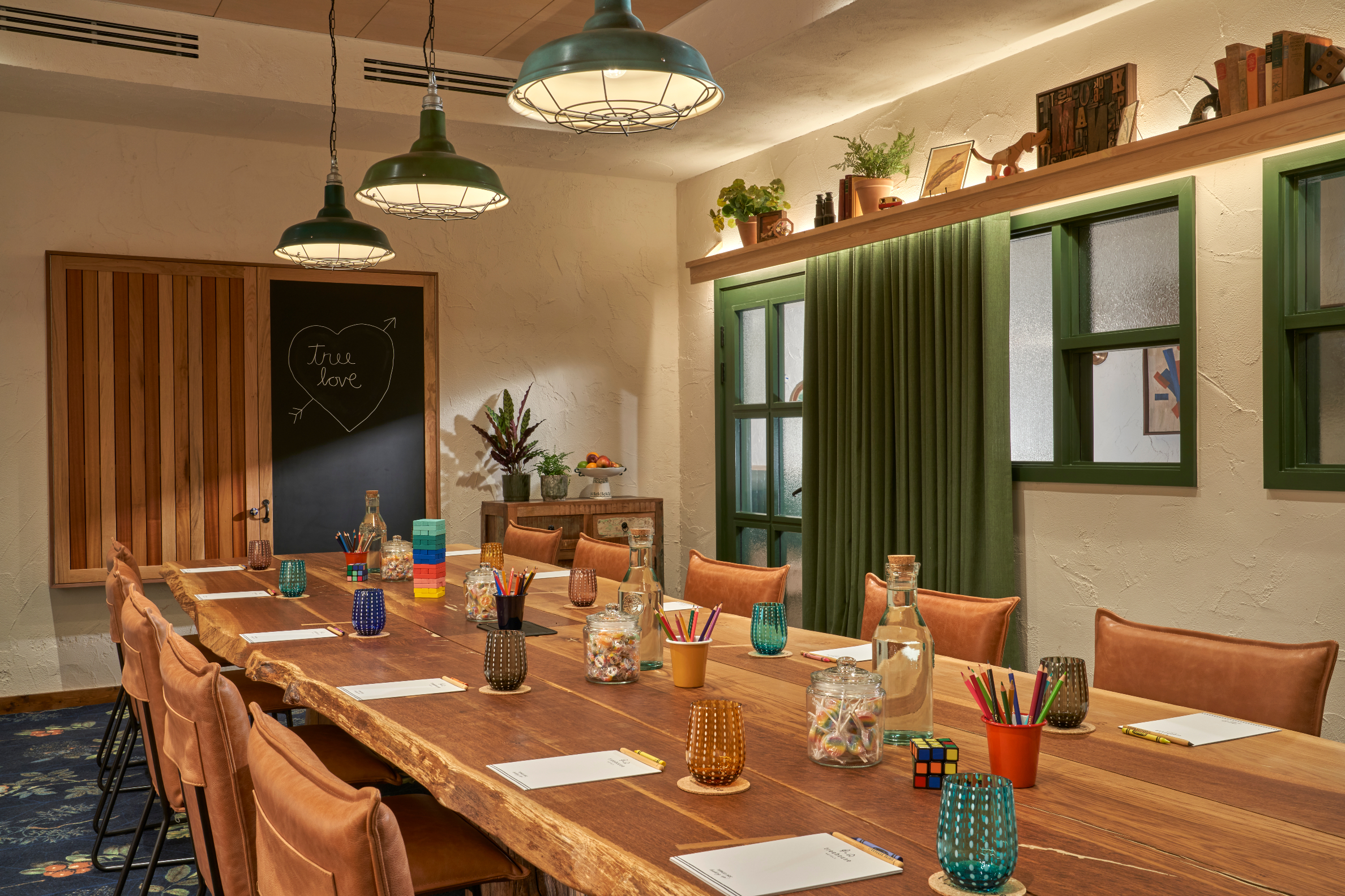Walnut meeting room in Treehouse Hotel Manchester, bright decor for workshops and meetings.