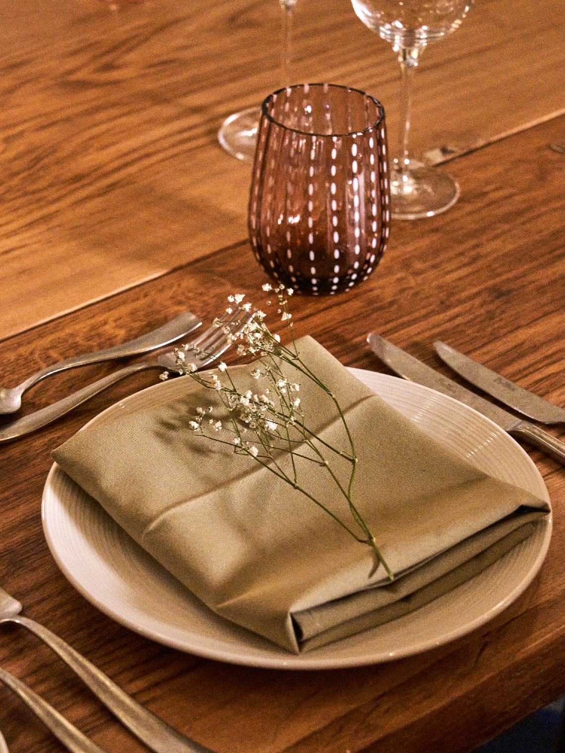 Elegant table setting at Treehouse Hotel Manchester with floral napkin for upscale events.