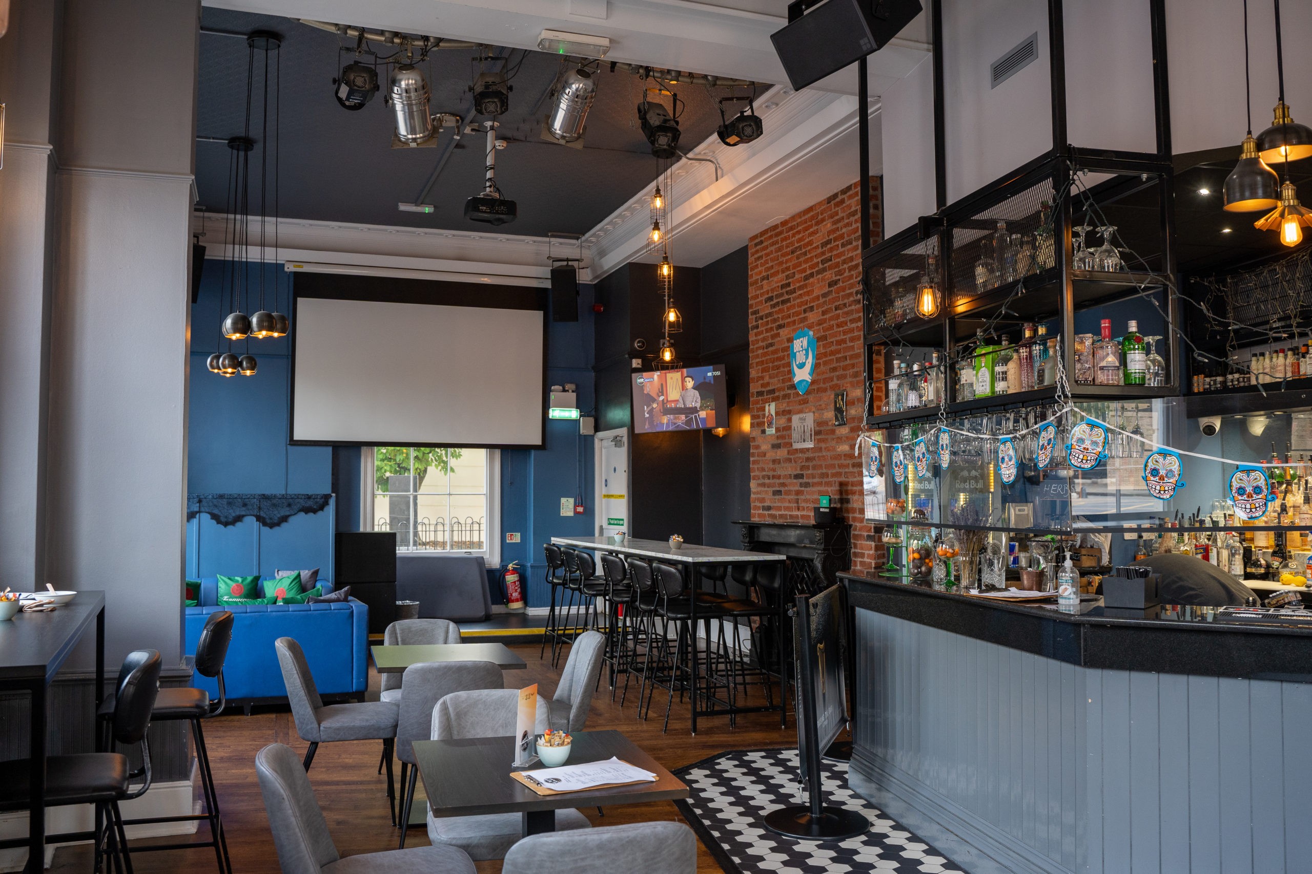 The Thirsty Scholar event space with modern decor, perfect for networking and gatherings.