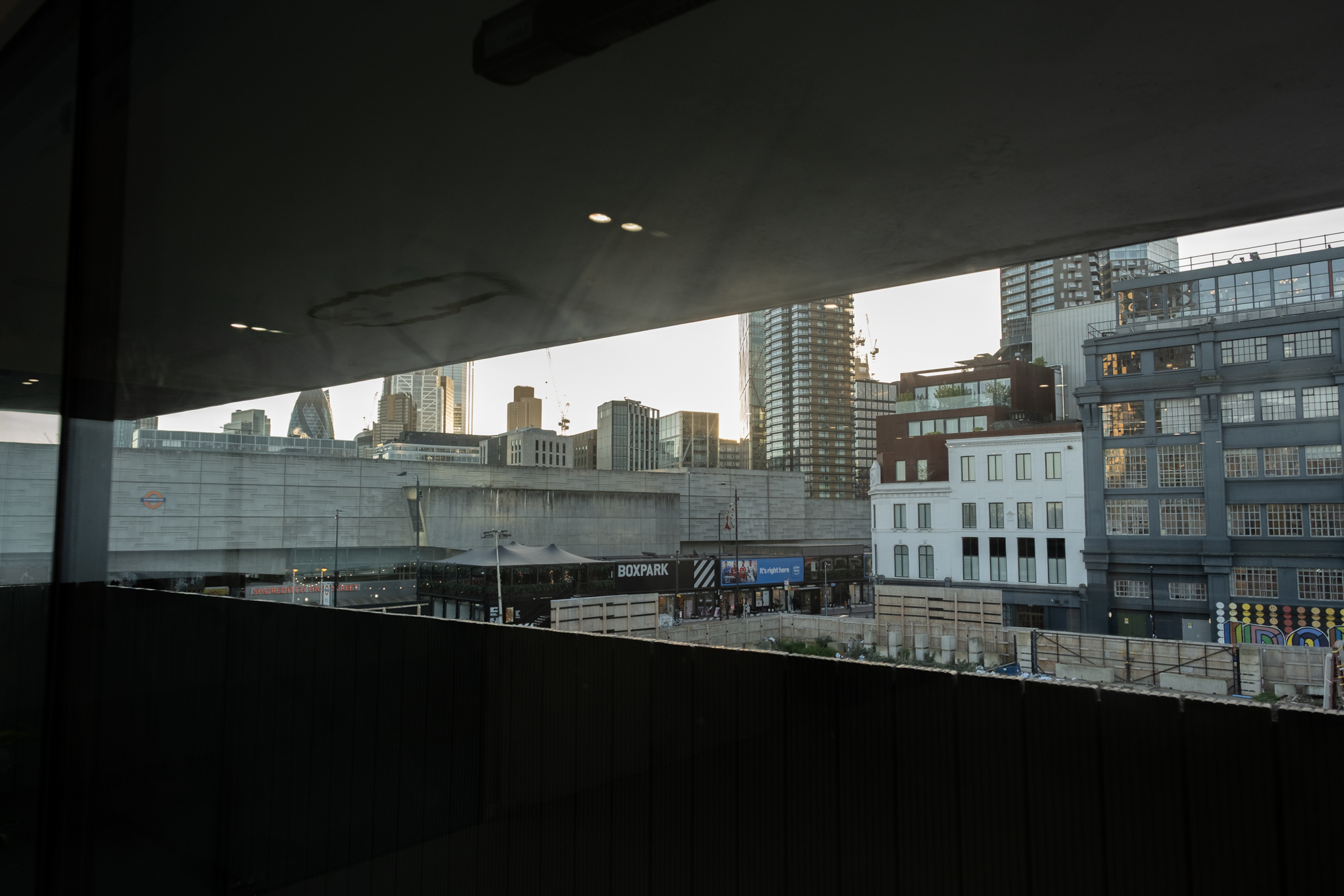 Industrial-chic Rogue Room event space with city backdrop for cocktail receptions and press launches.