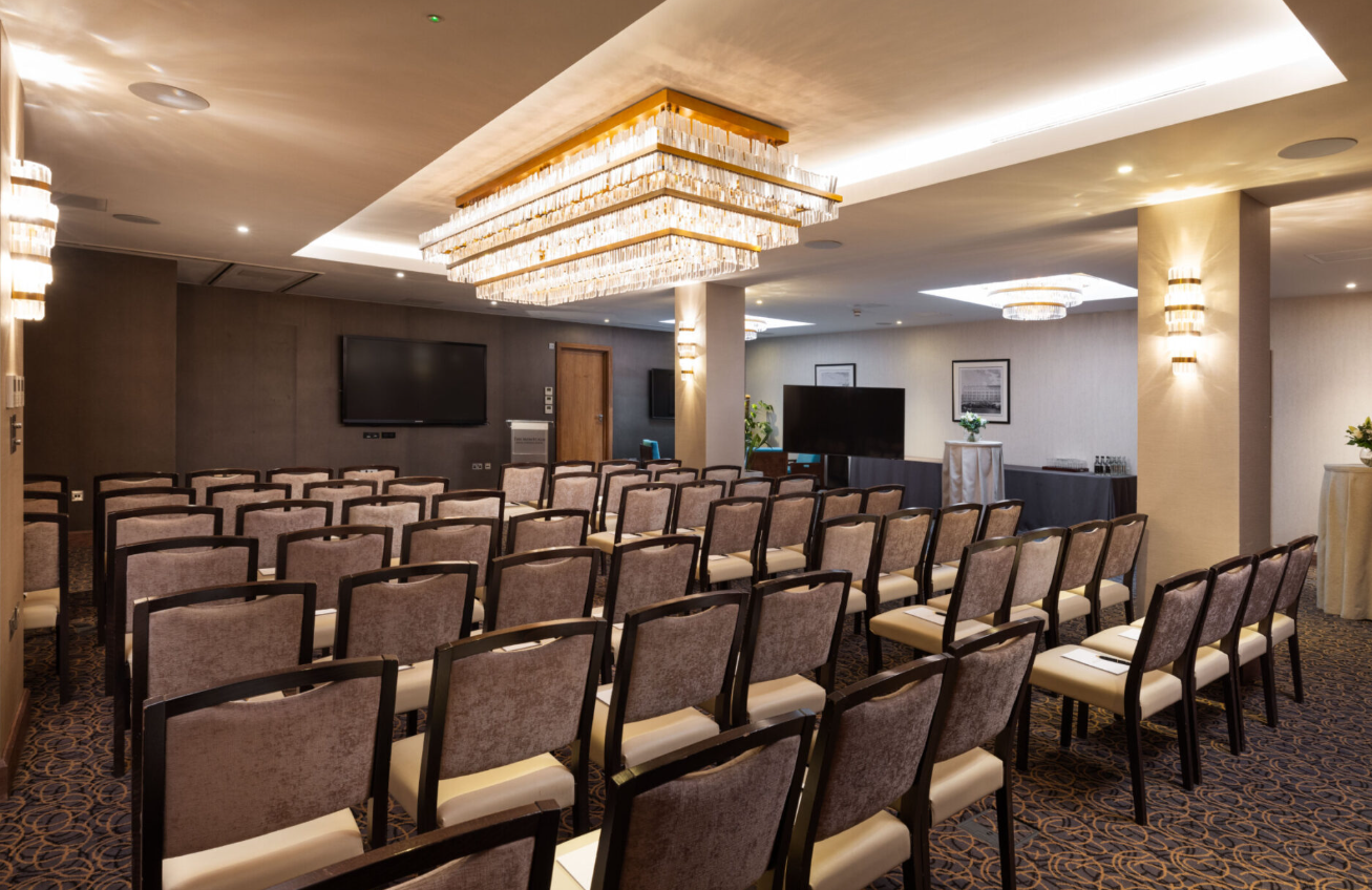 Elegant meeting space with chandeliers for corporate events at Montcalm Royal London House.