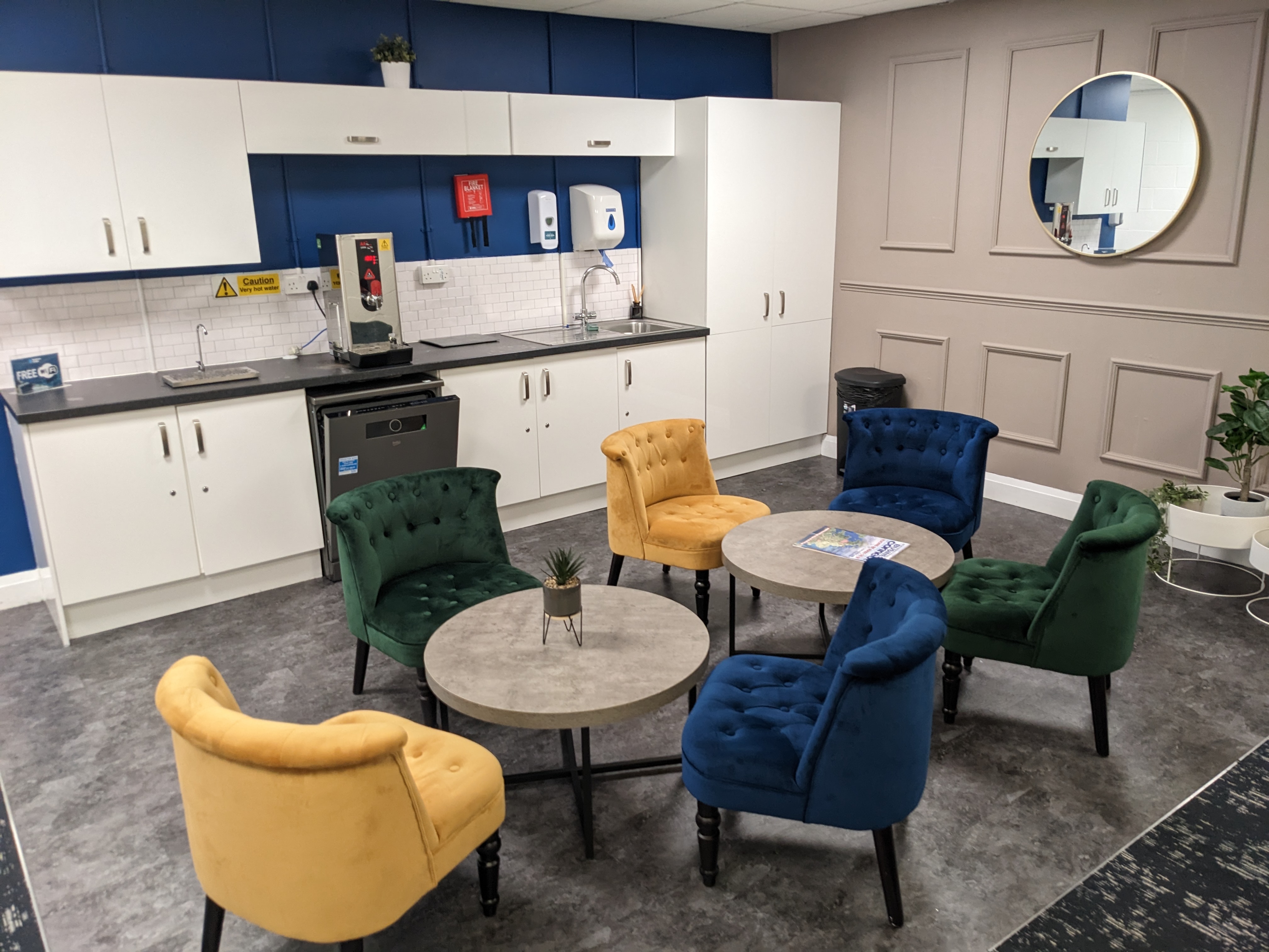 Europa House Conference Room with vibrant chairs, ideal for meetings and events.