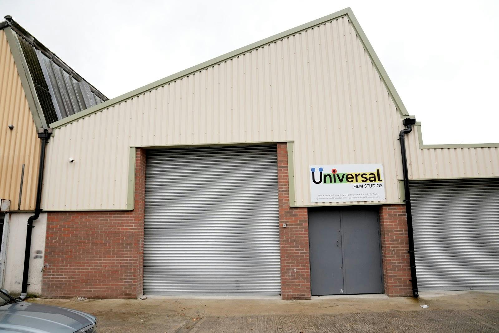 Production studio with large garage door, versatile for events and exhibitions at Universal Film Studios.