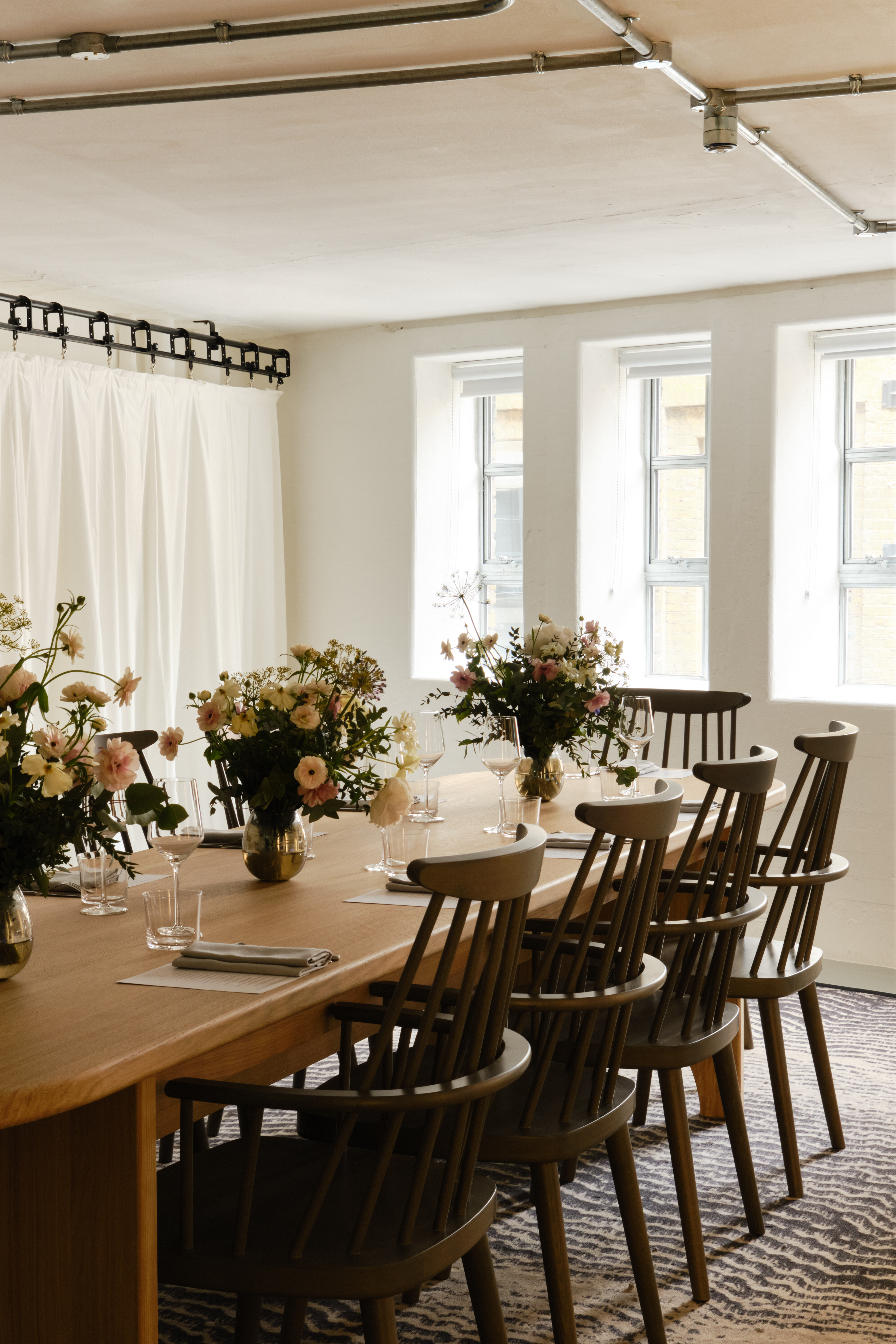 George Room at Shoreditch Arts Club: elegant meeting space with long wooden table, perfect for workshops.