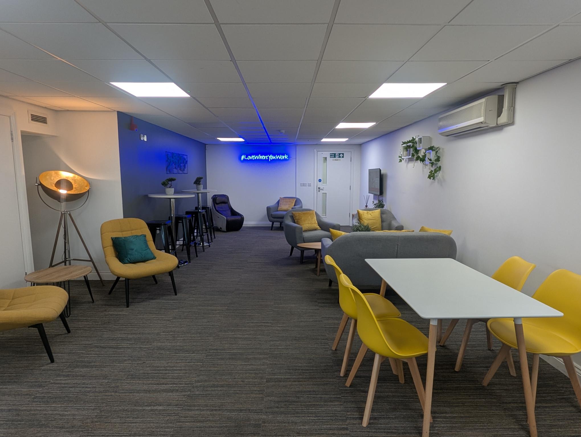 Modern meeting room in Bury Businesslodge ideal for brainstorming and networking.