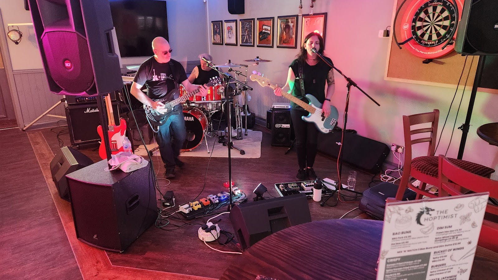 Live music setup at The Hoptimist bar, perfect for concerts and social mixers.