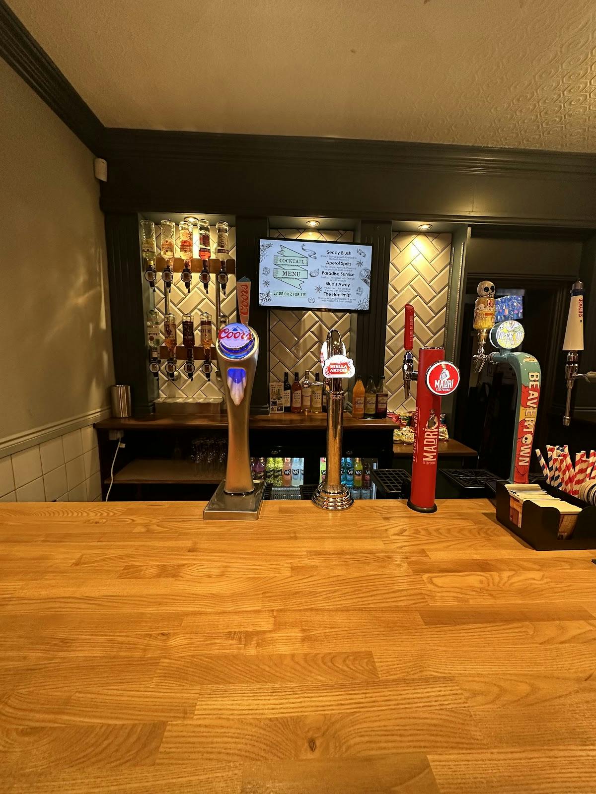 Bar setup with sleek beer taps for stylish cocktail receptions and networking events.