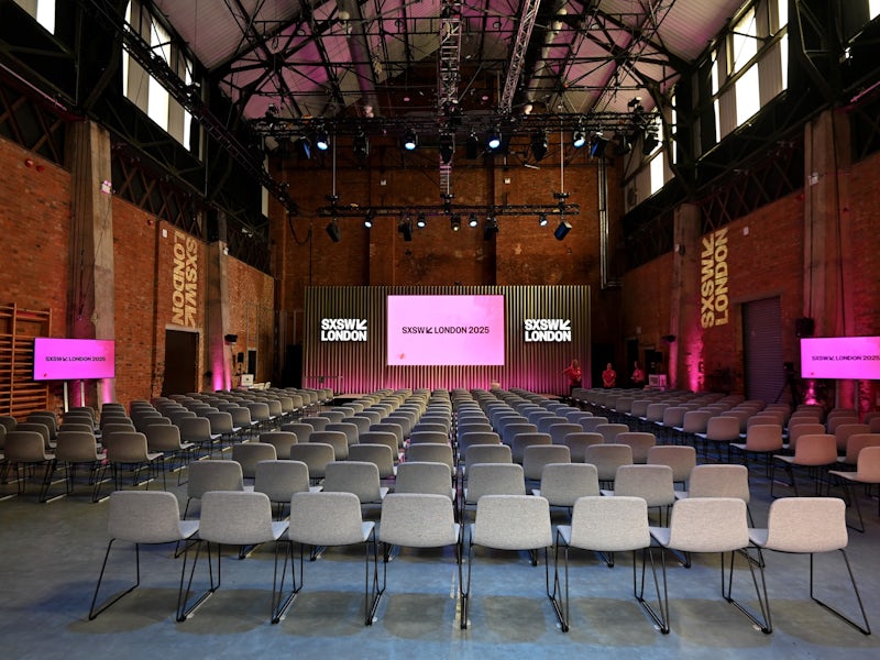 Spacious Shoreditch event venue for conferences with modern decor and ample seating.