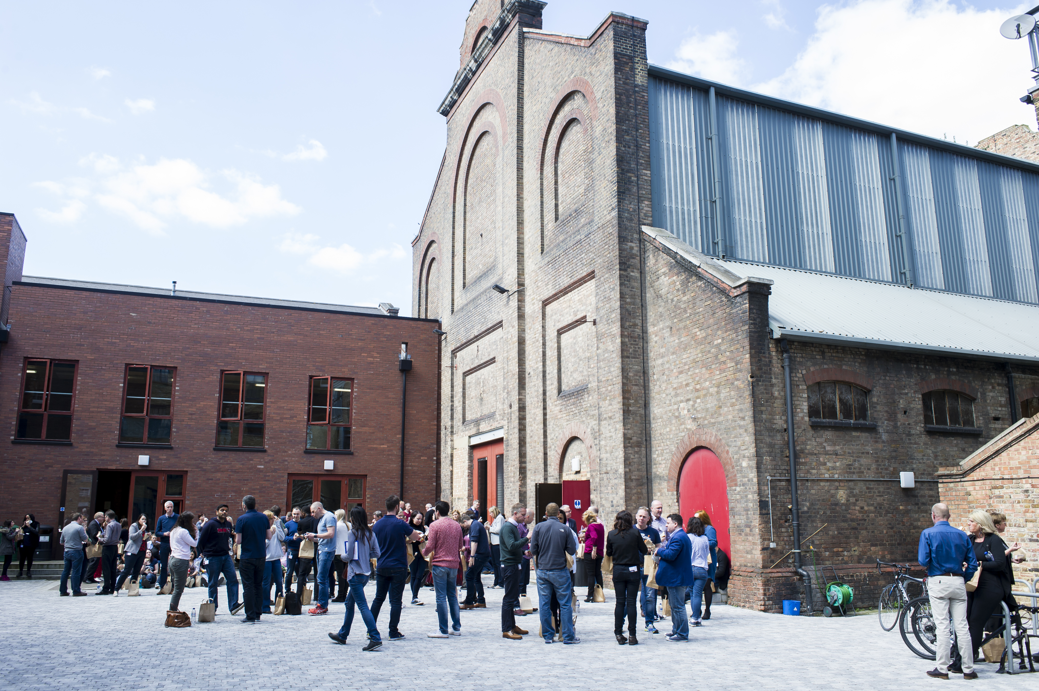 Vibrant outdoor gathering at Shoreditch Electric venue, ideal for networking events.