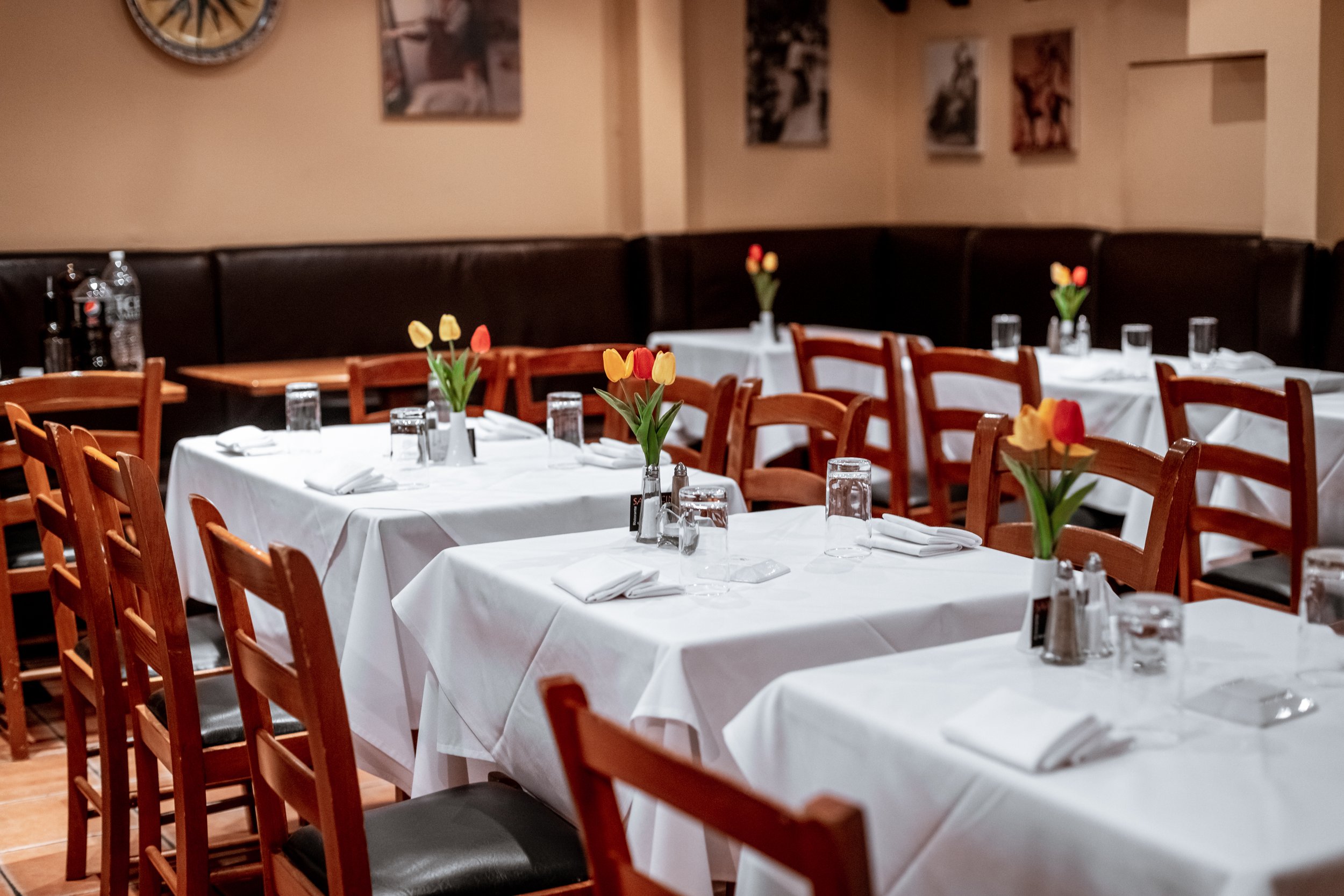 Cozy event space at Sarracino Italian Restaurant with tulip decor for intimate gatherings.