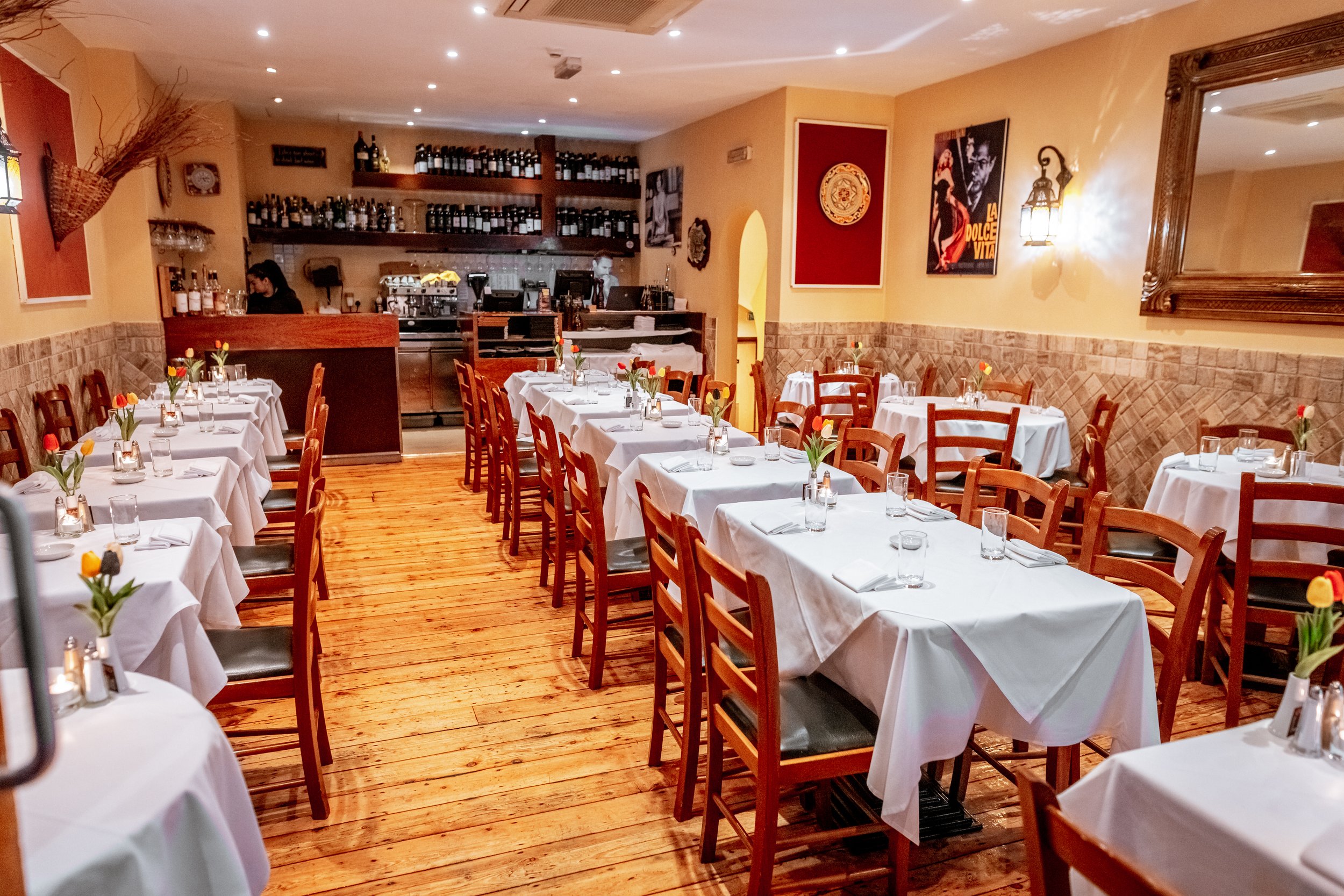 Cozy dining room at Sarracino Italian Restaurant, perfect for intimate gatherings and events.