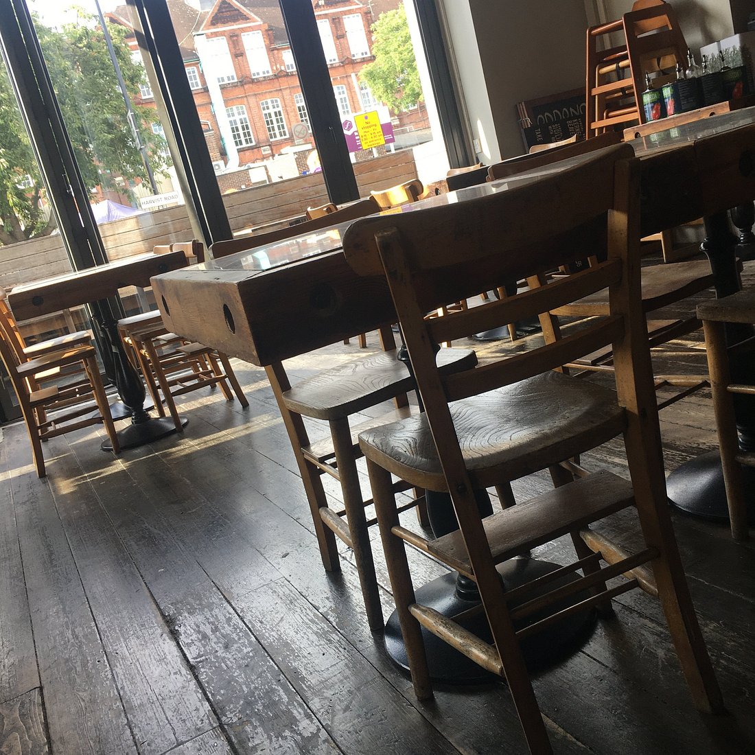 Casual dining room with wooden furniture at Sarracino Italian Restaurant for gatherings