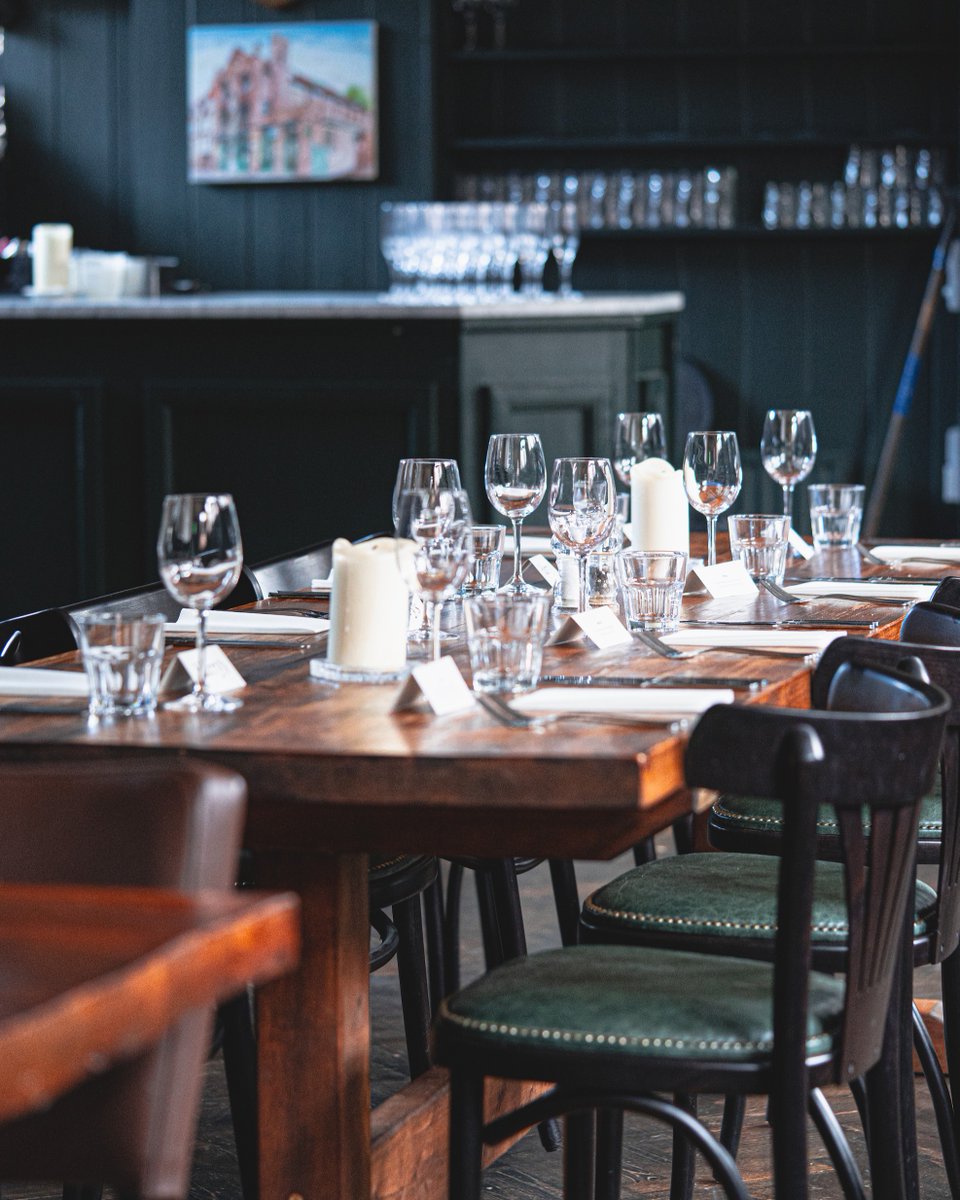 Elegant dining setup in Harry's Restaurant for private events and formal dinners.