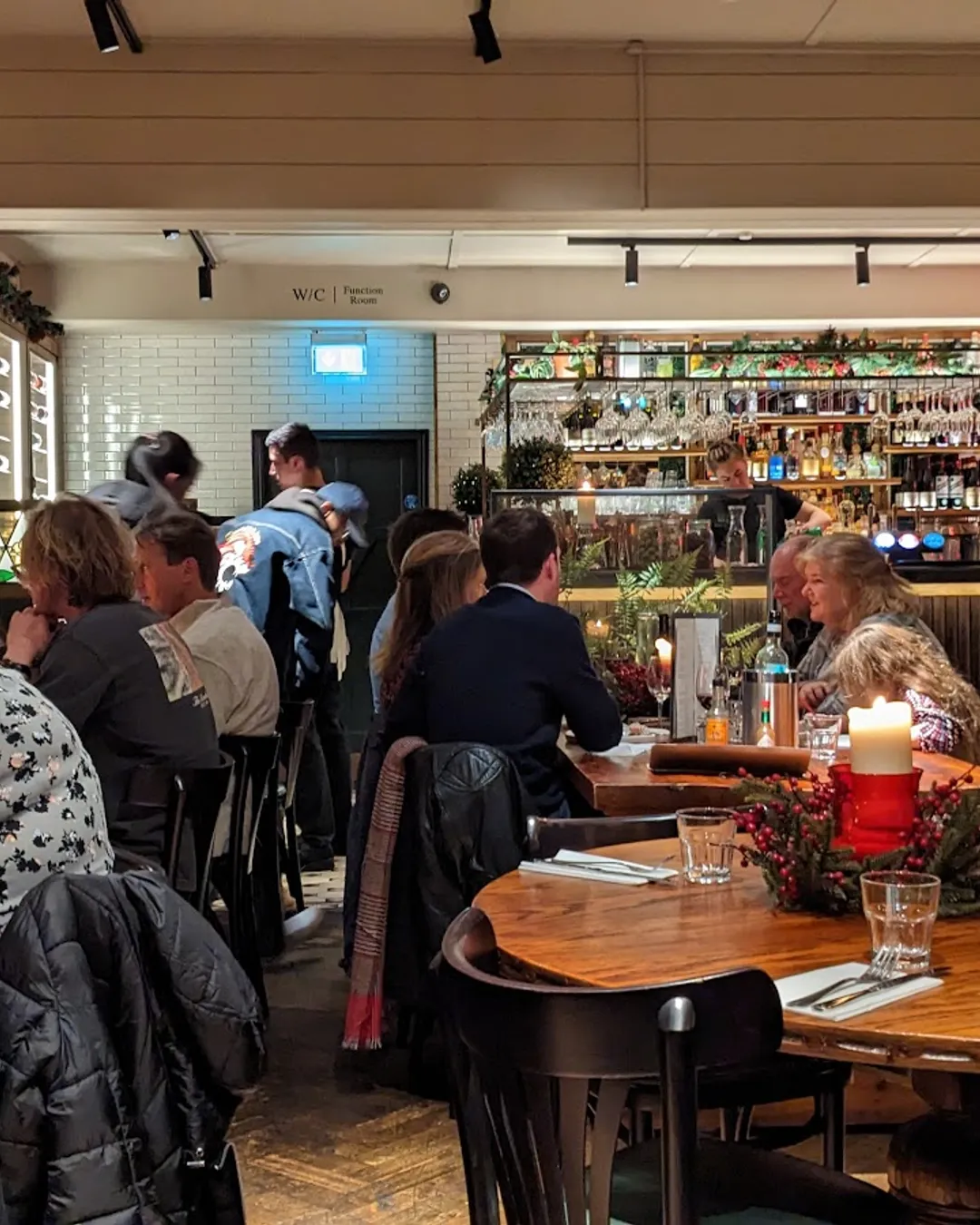 Private Events Room at Harry's Restaurant, lively dining, ideal for social gatherings.