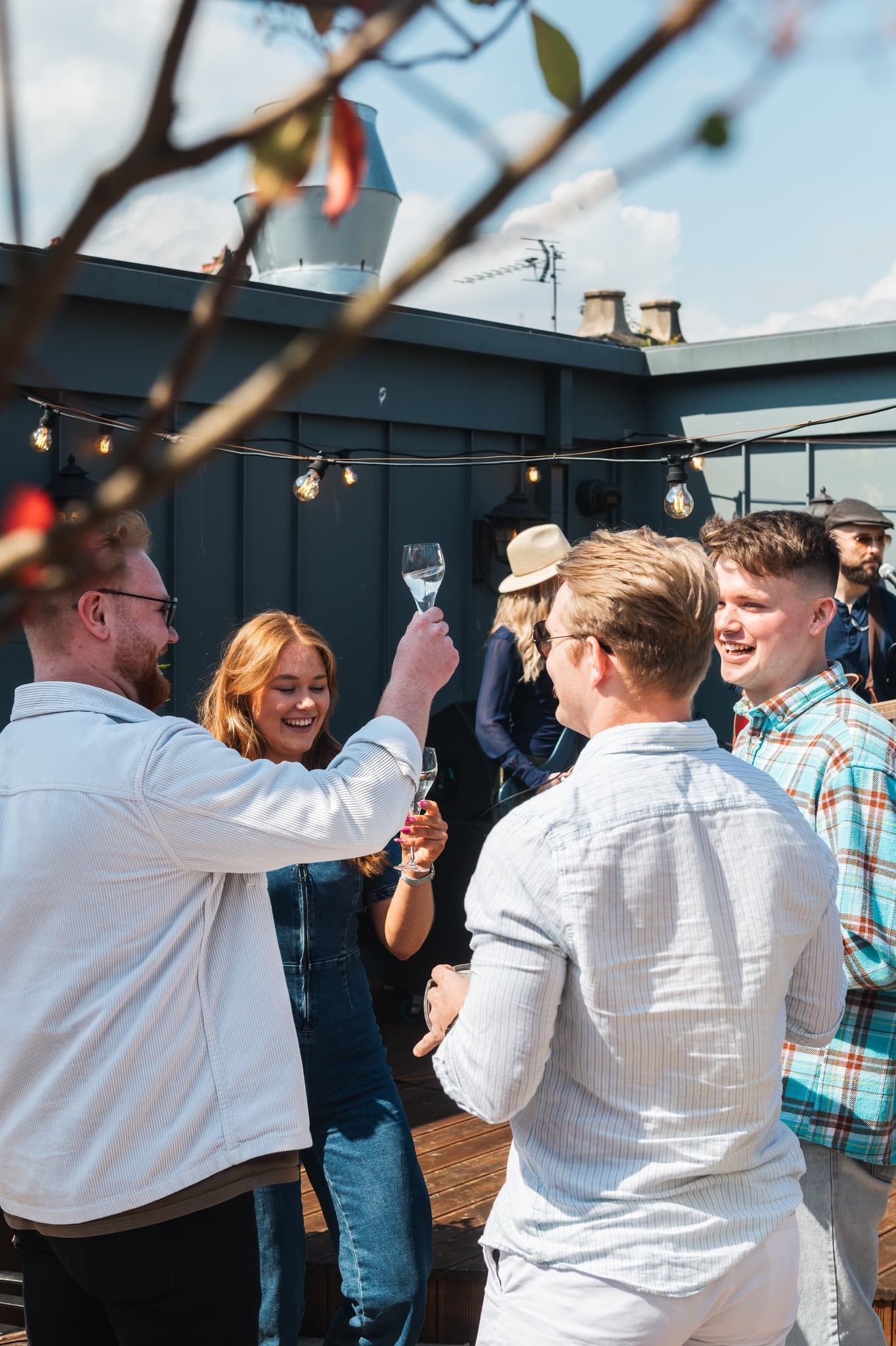 Vibrant rooftop networking event at Area Hire, The Botanist Exeter with stylish decor.