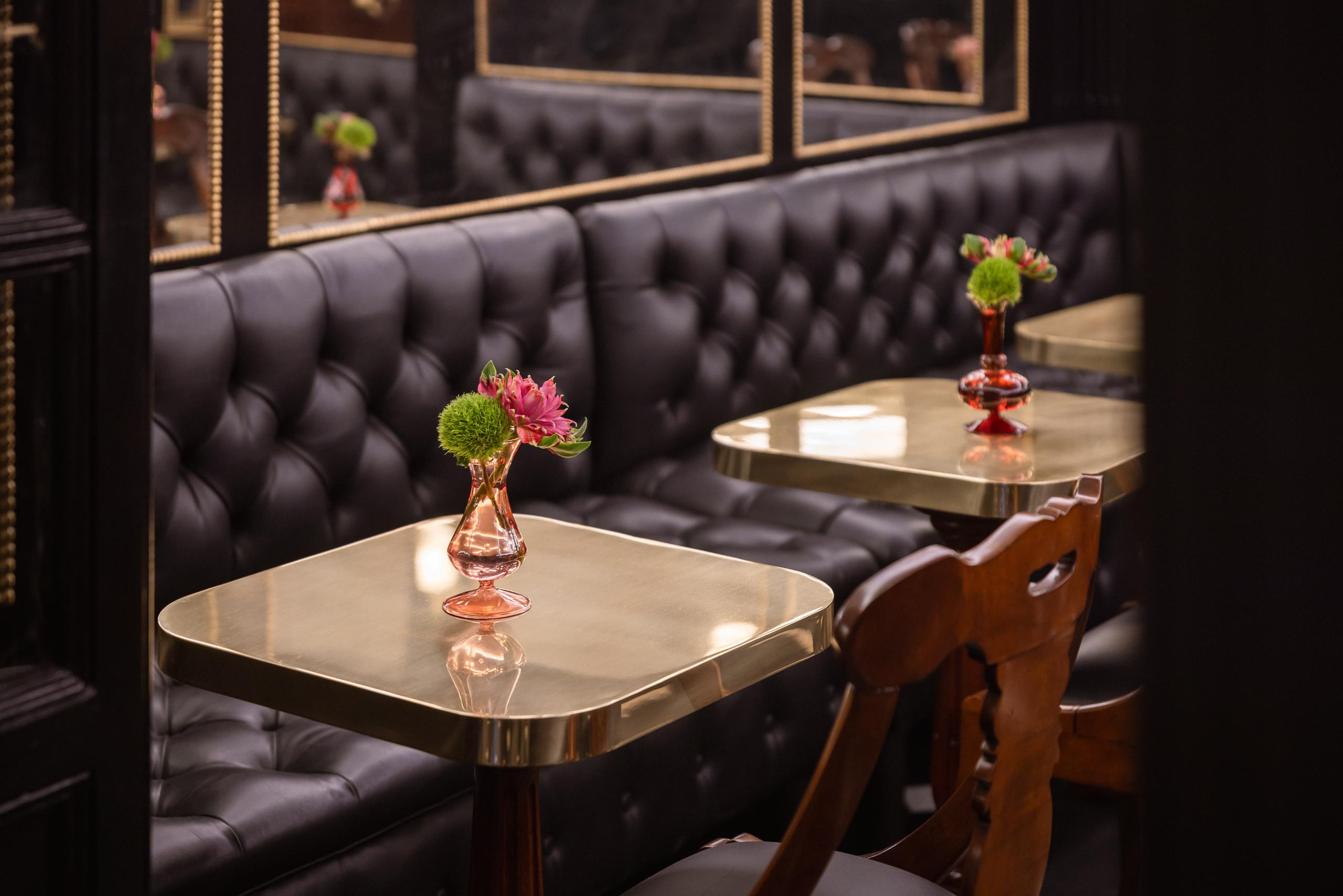 Elegant meeting space in Roam West with plush seating, ideal for networking events.