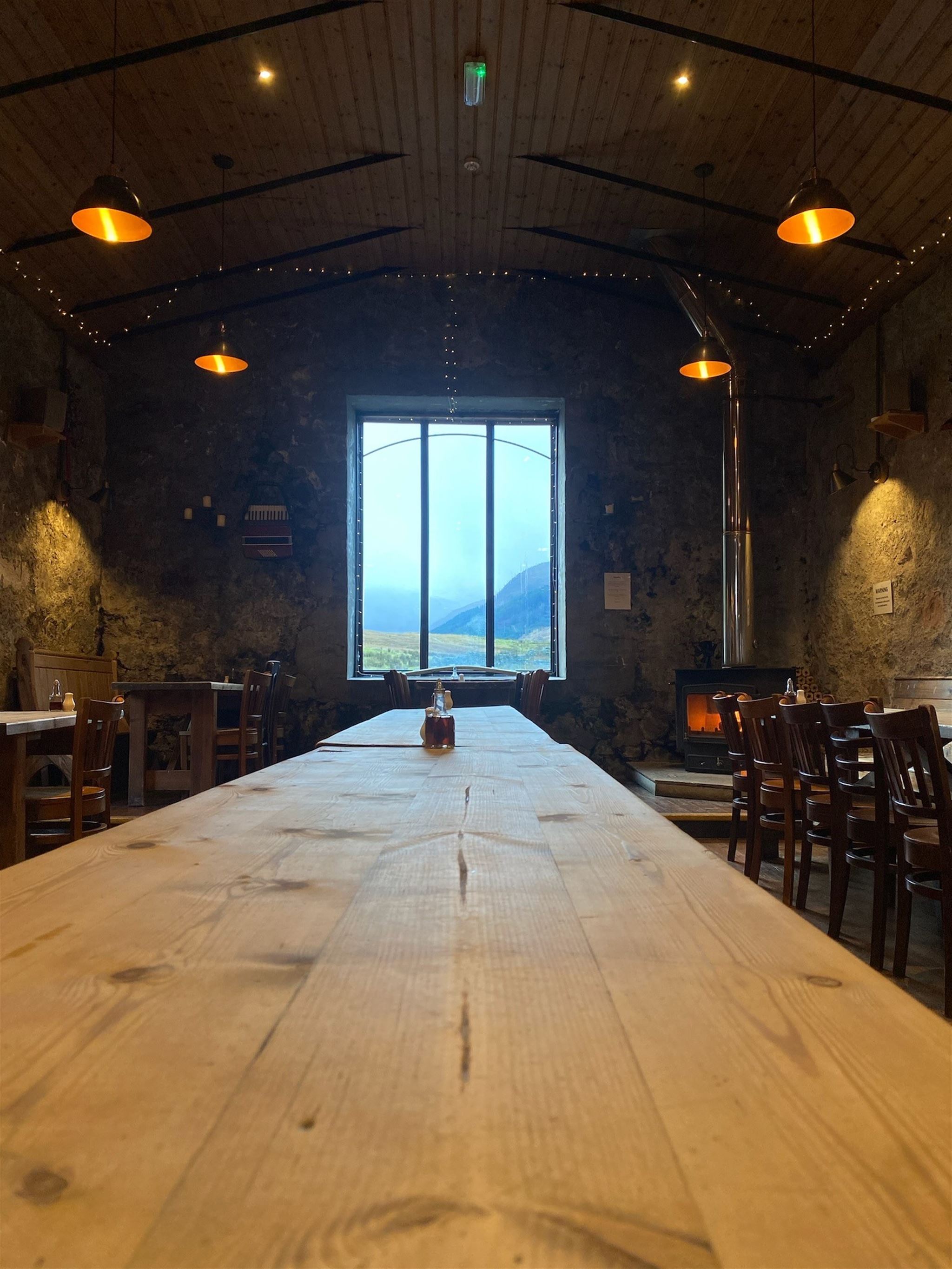 Rustic Main Barn event space with scenic views, ideal for retreats and meetings.