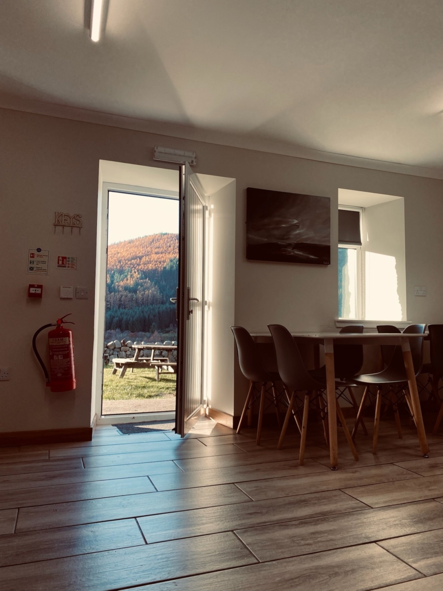 Inviting meeting space in Ben Nevis Inn's Main Barn for retreats and workshops.