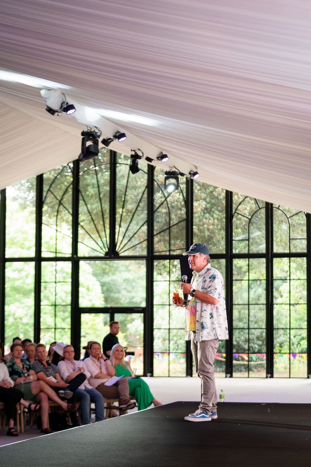 Speaker engaging attentive audience in bright, open venue at The Clementine, Syon Park event.