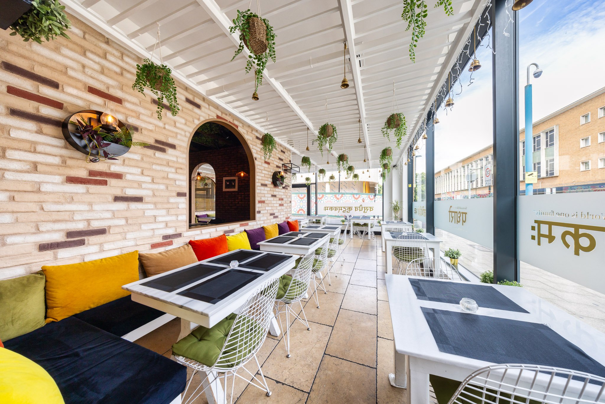 Vibrant event venue at Padharo Indian Restaurant with cozy seating for networking events.