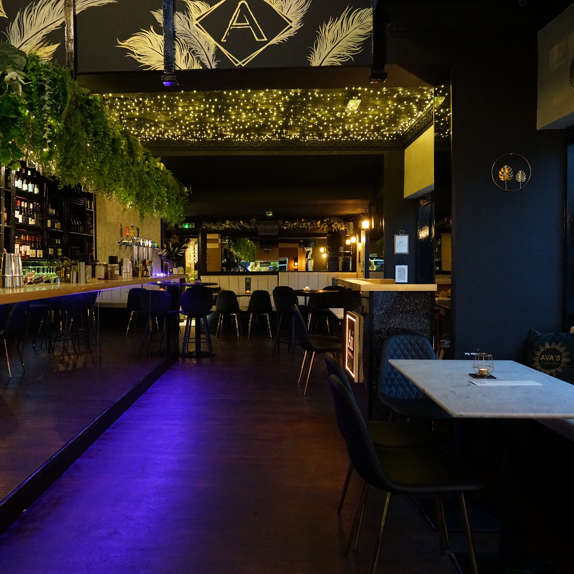 Chic private dining venue with ambient lighting for intimate meetings and events.