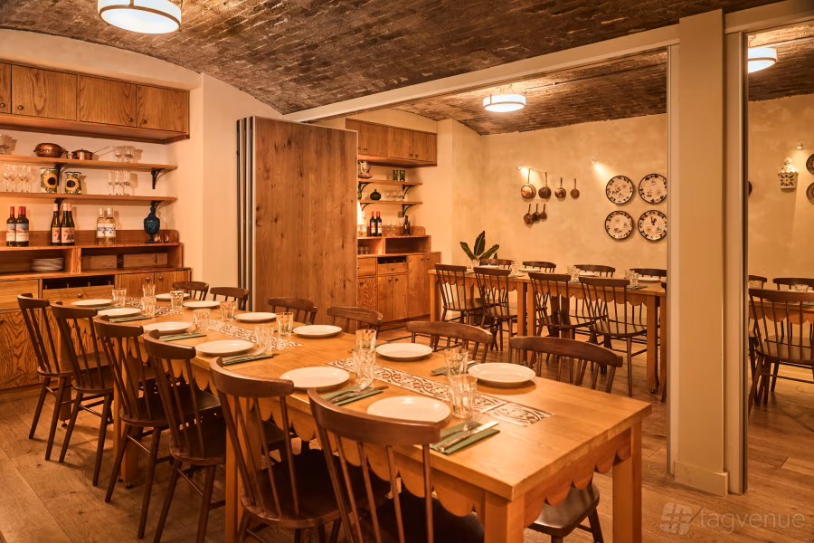 Private dining room at Casa Mayfair with rustic decor for intimate gatherings and corporate dinners.