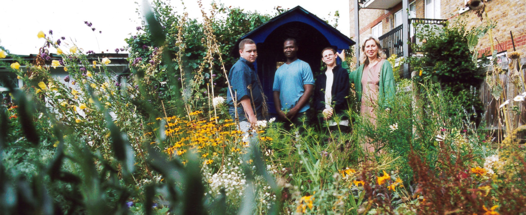 Main Hall & Gardens vibrant community garden for outdoor events and workshops.