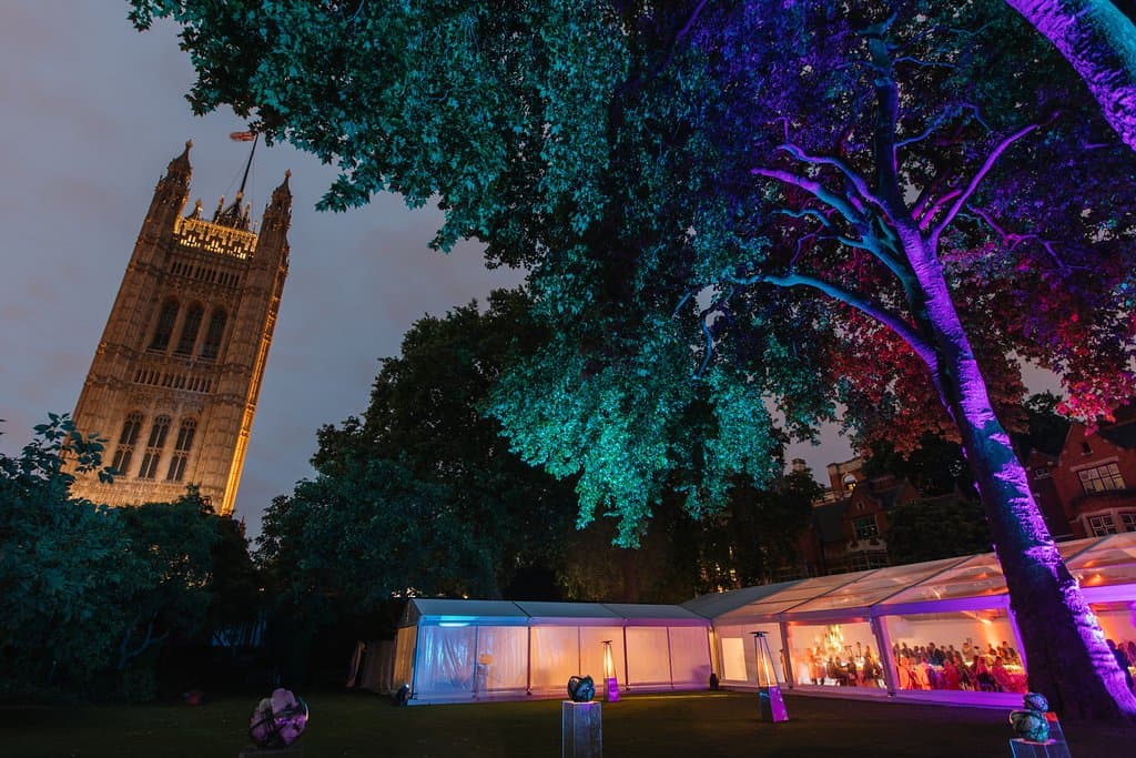 "Pavilion Gardens event space with elegant marquee and vibrant lighting in Hyde Park"