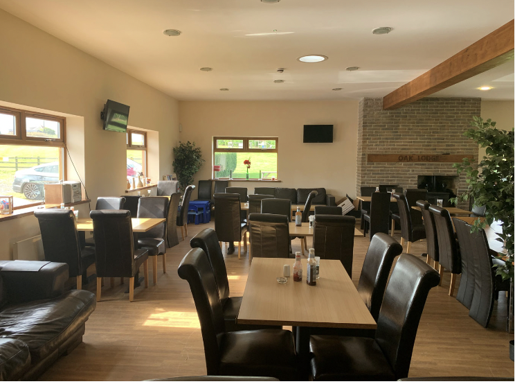 Spacious Oak Lodge Shooting Ground clubhouse for meetings and events with natural light.