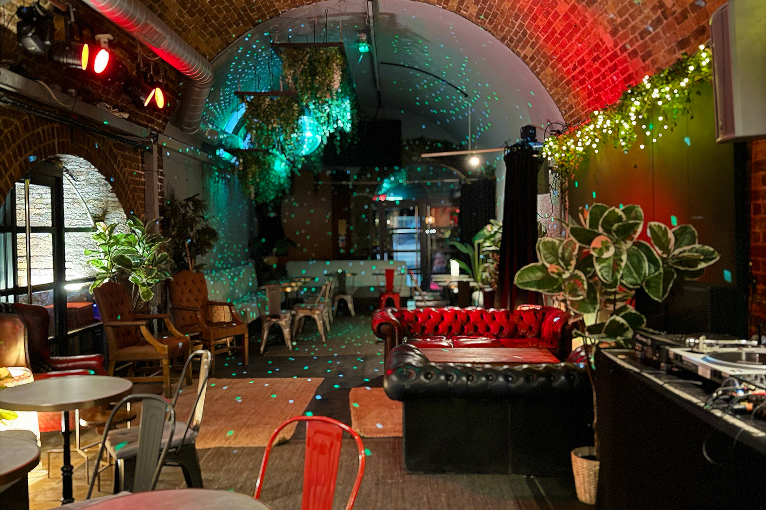 Garden + Main Arch in Rolling Stock London, arched brick ceiling, event venue for gatherings.