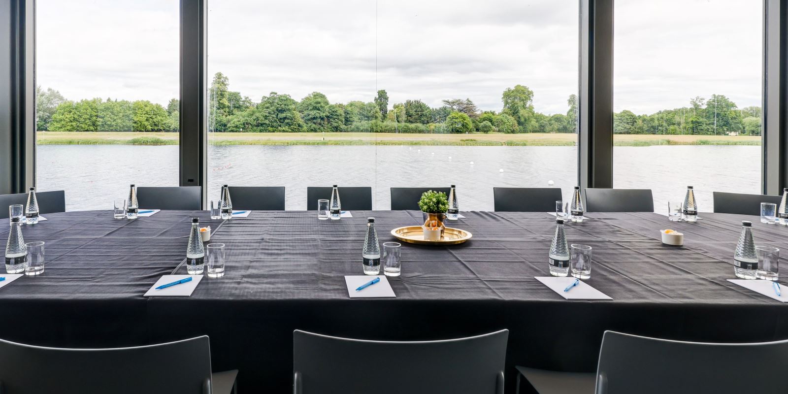 Modern meeting room with waterside view at Dorney Village Hall for conferences.