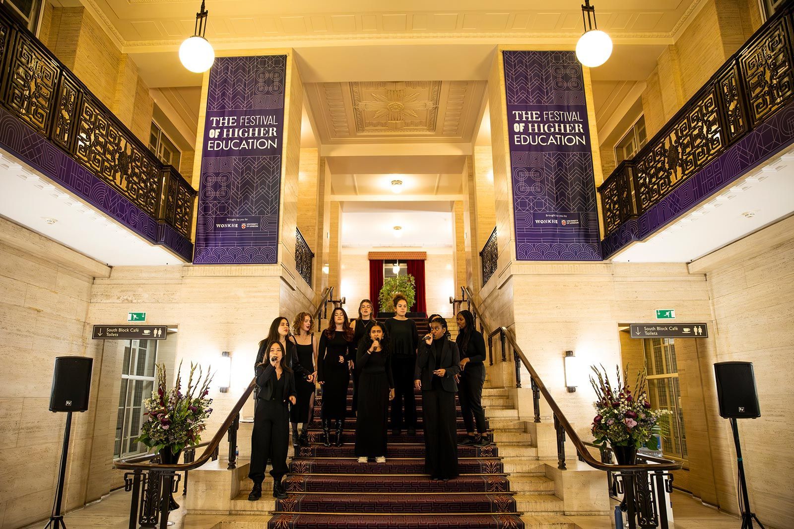 Elegant staircase at Beveridge Hall for a higher education festival event.