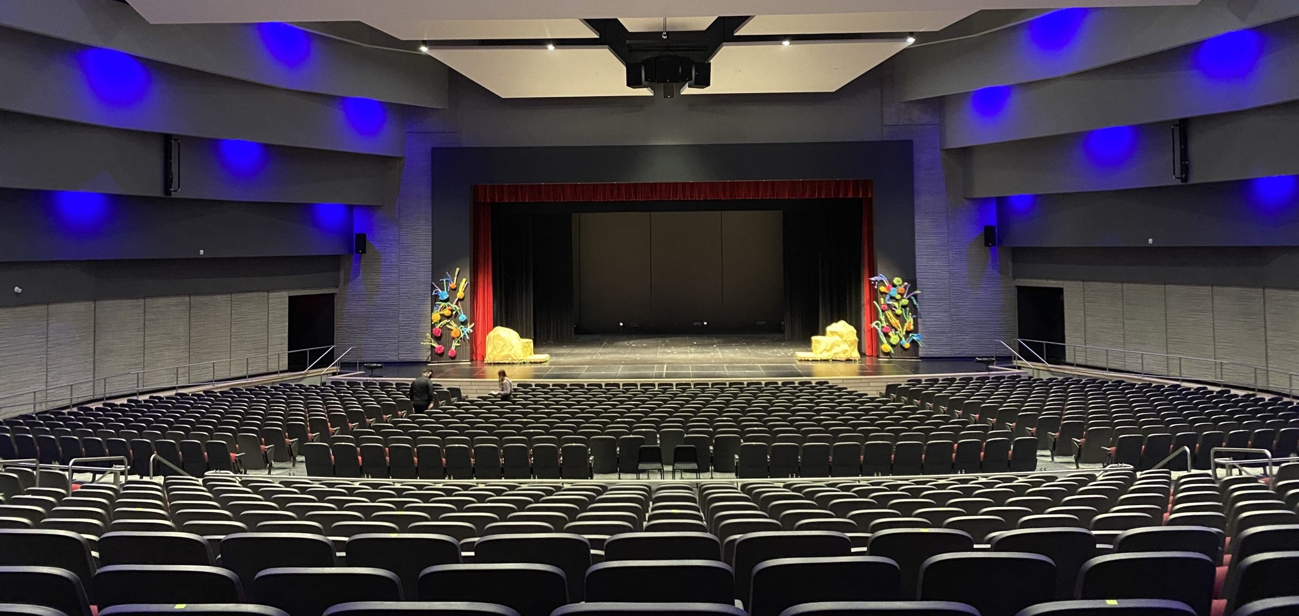 Spacious auditorium with tiered seating for versatile events, including concerts and conferences.