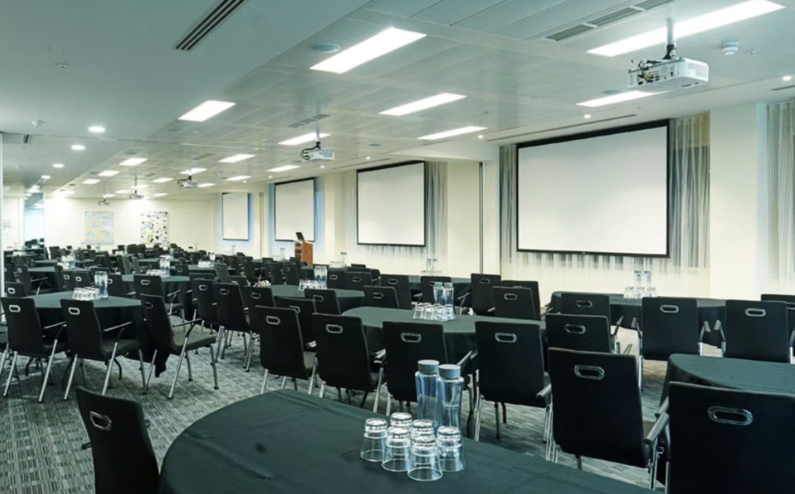 Spacious conference room at City Wing, ideal for workshops and presentations.