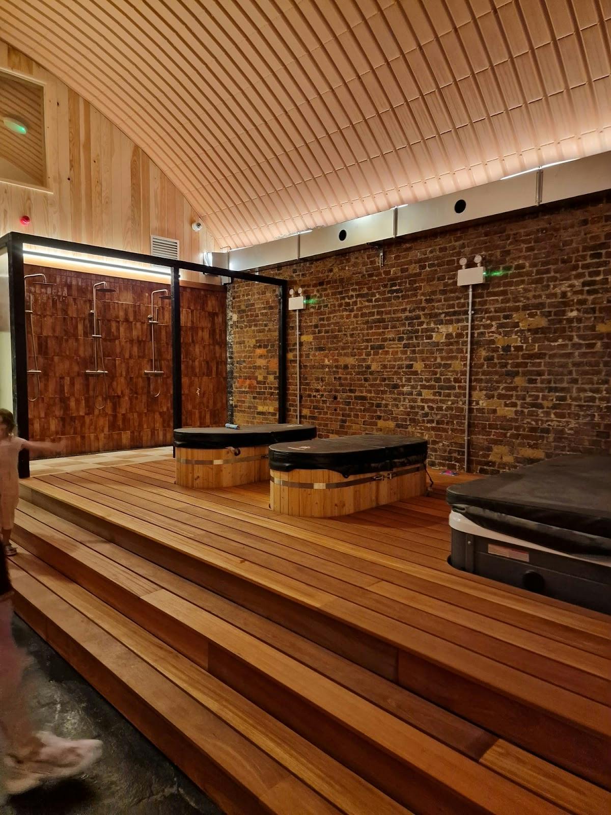 Wellness Centre at WellNest with wooden decking, ideal for retreats and exclusive gatherings.