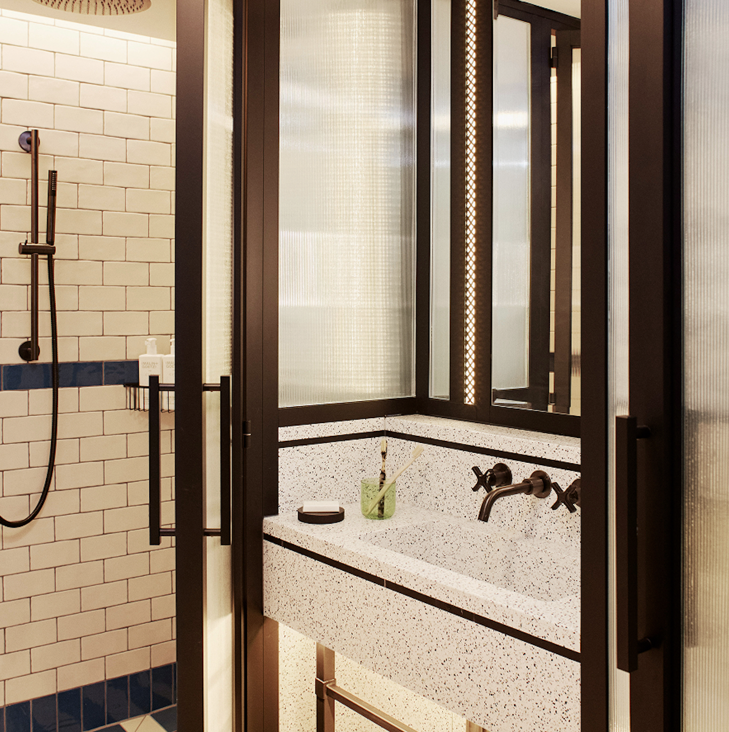 Luxury bathroom in Hyde London City, sleek design for sophisticated events.