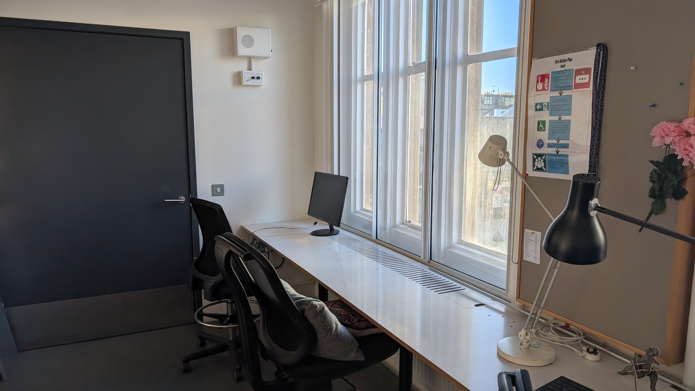 Modern minimalist office space at Bush Theatre, perfect for meetings and brainstorming.