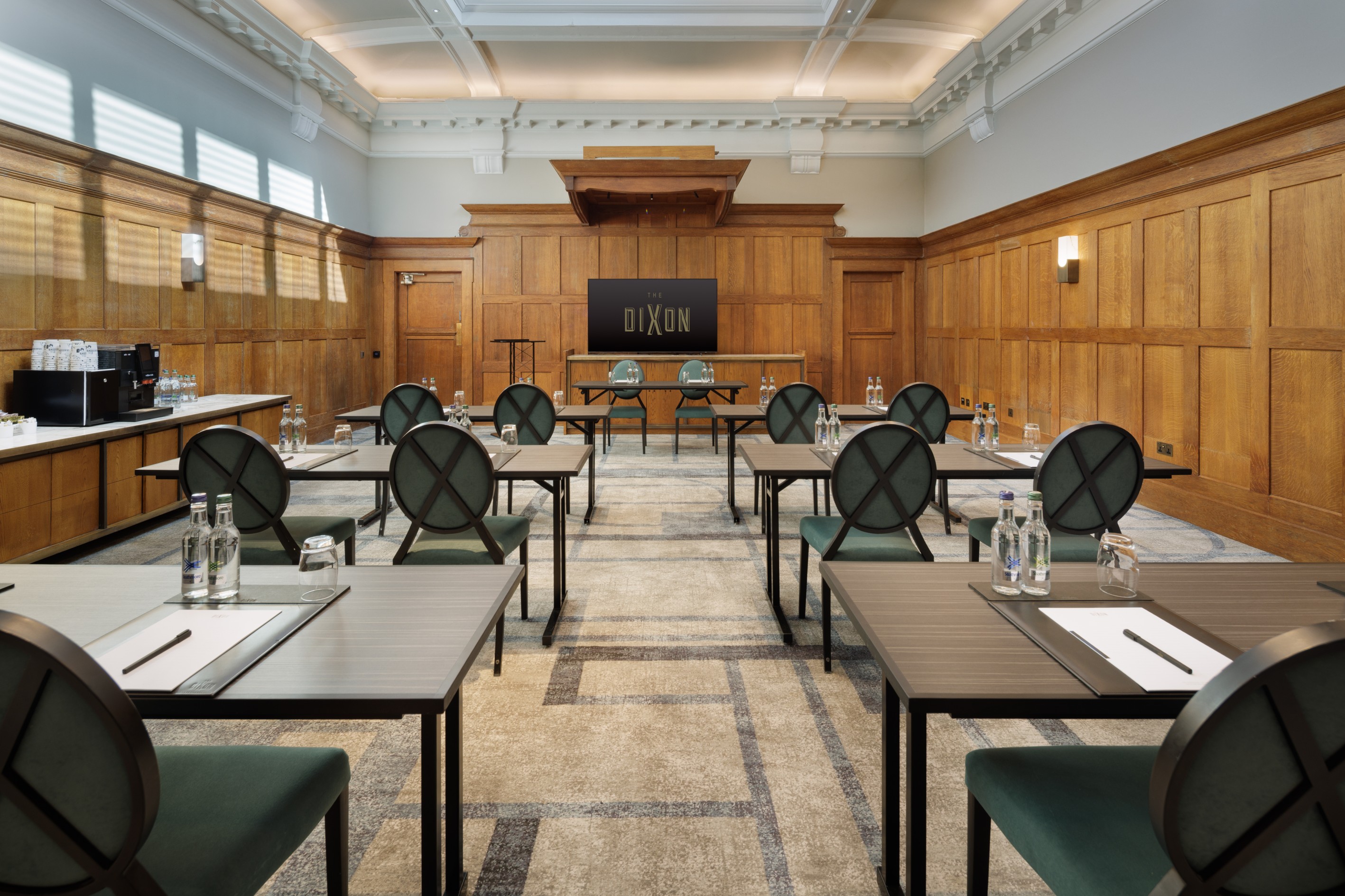 Elegant meeting room with wood paneling for corporate events and workshops at Tower Bridge.