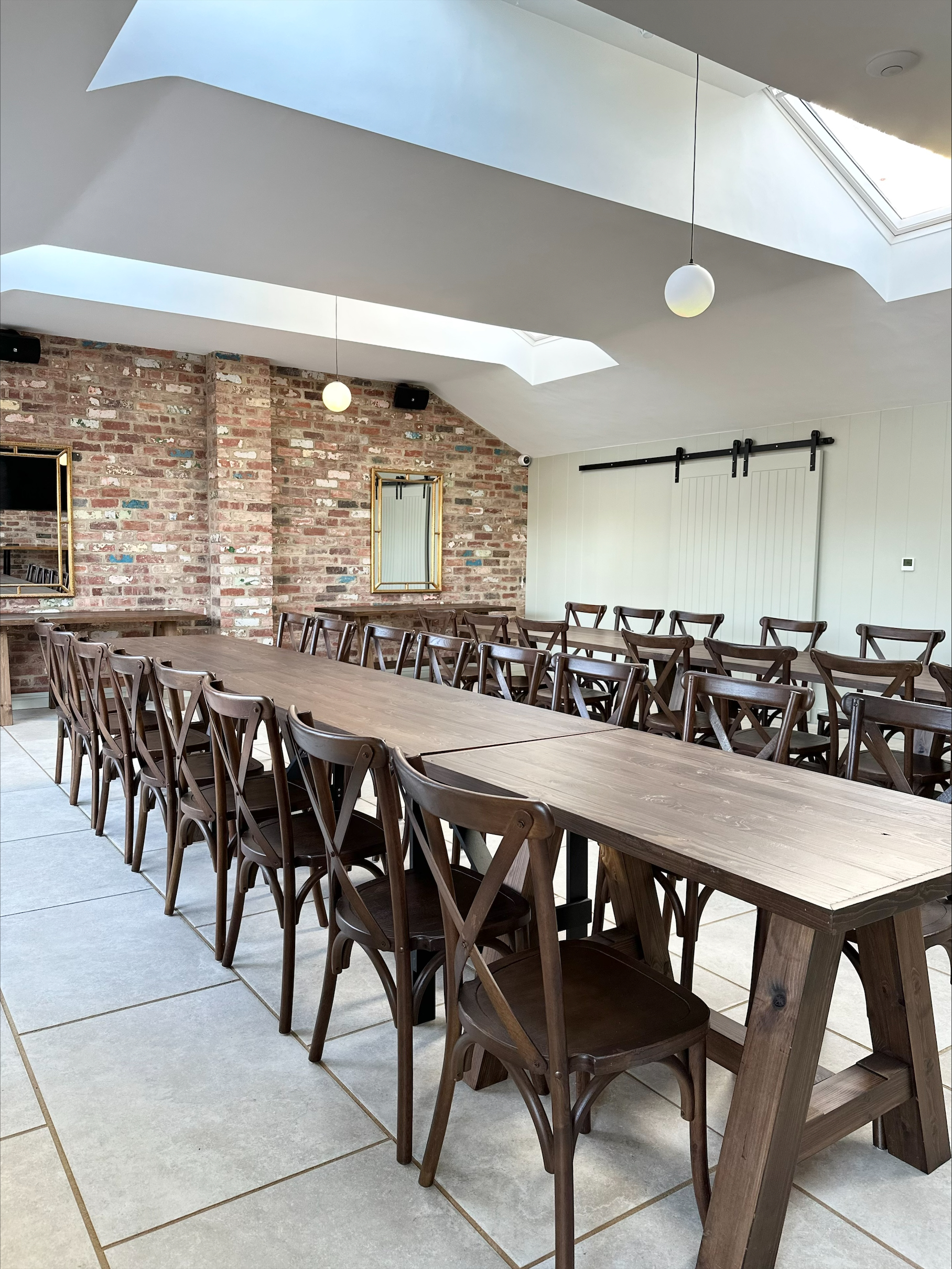 Olive Room Function Space with rustic table, ideal for meetings and workshops.