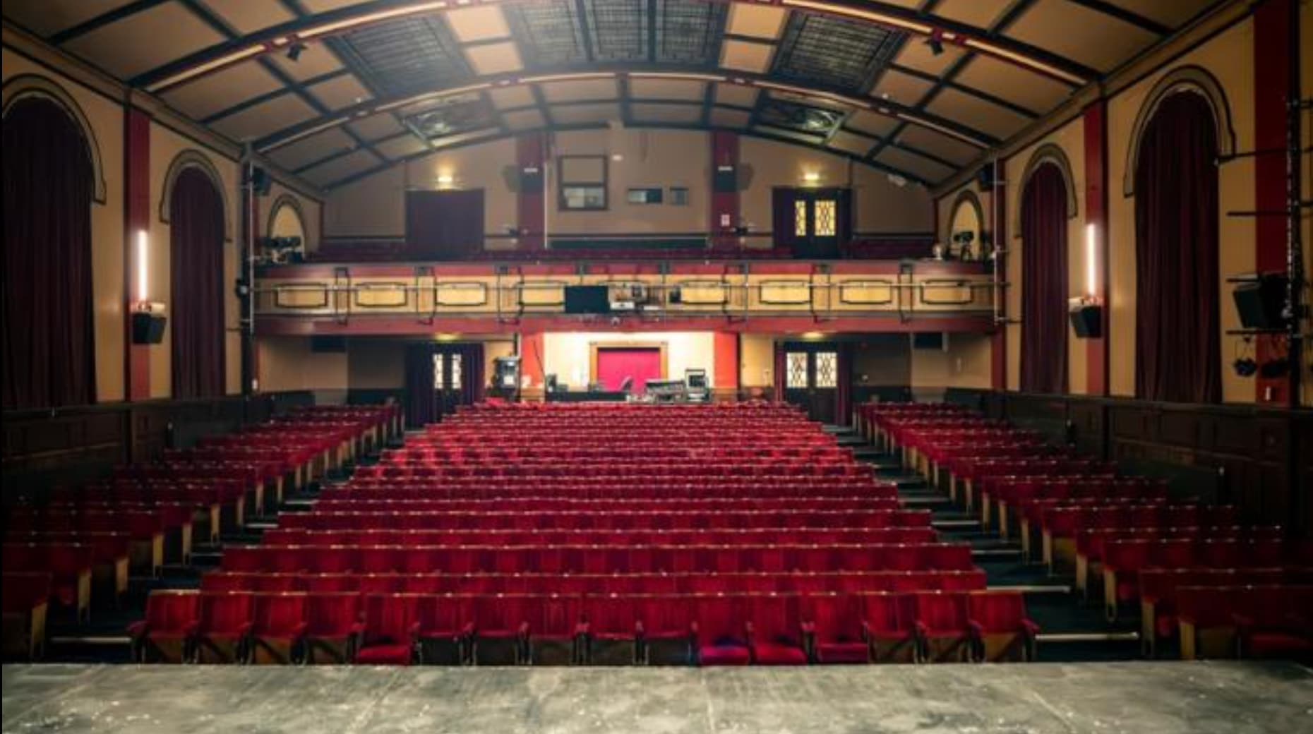 Main Auditorium at Albany Theatre, Coventry: Proscenium stage for keynotes and performing arts.